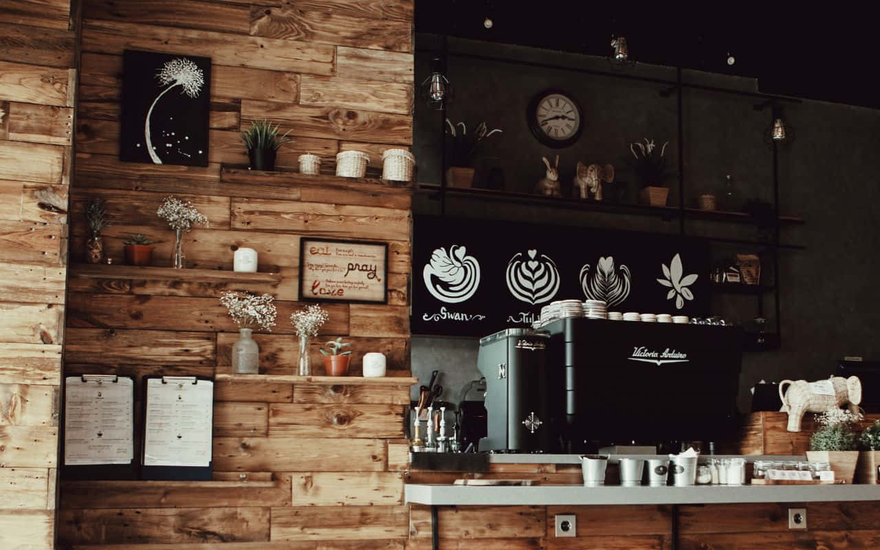 isang coffee shop na may mga pader na kahoy at isang counter na kahoy Wallpaper