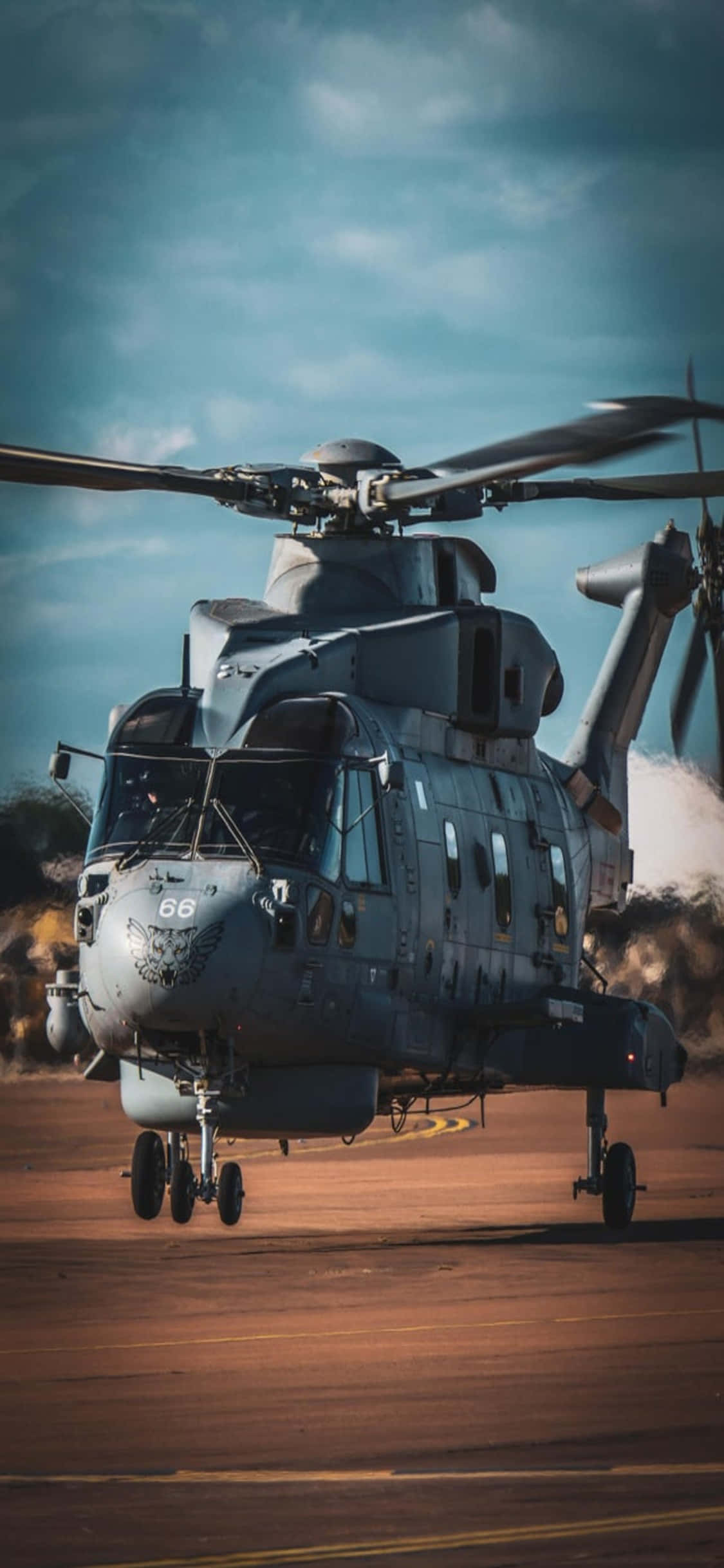 Isang tanaw ng langit mula sa isang helicopter, na nagtatampok ng isang iPhone Xs Wallpaper
