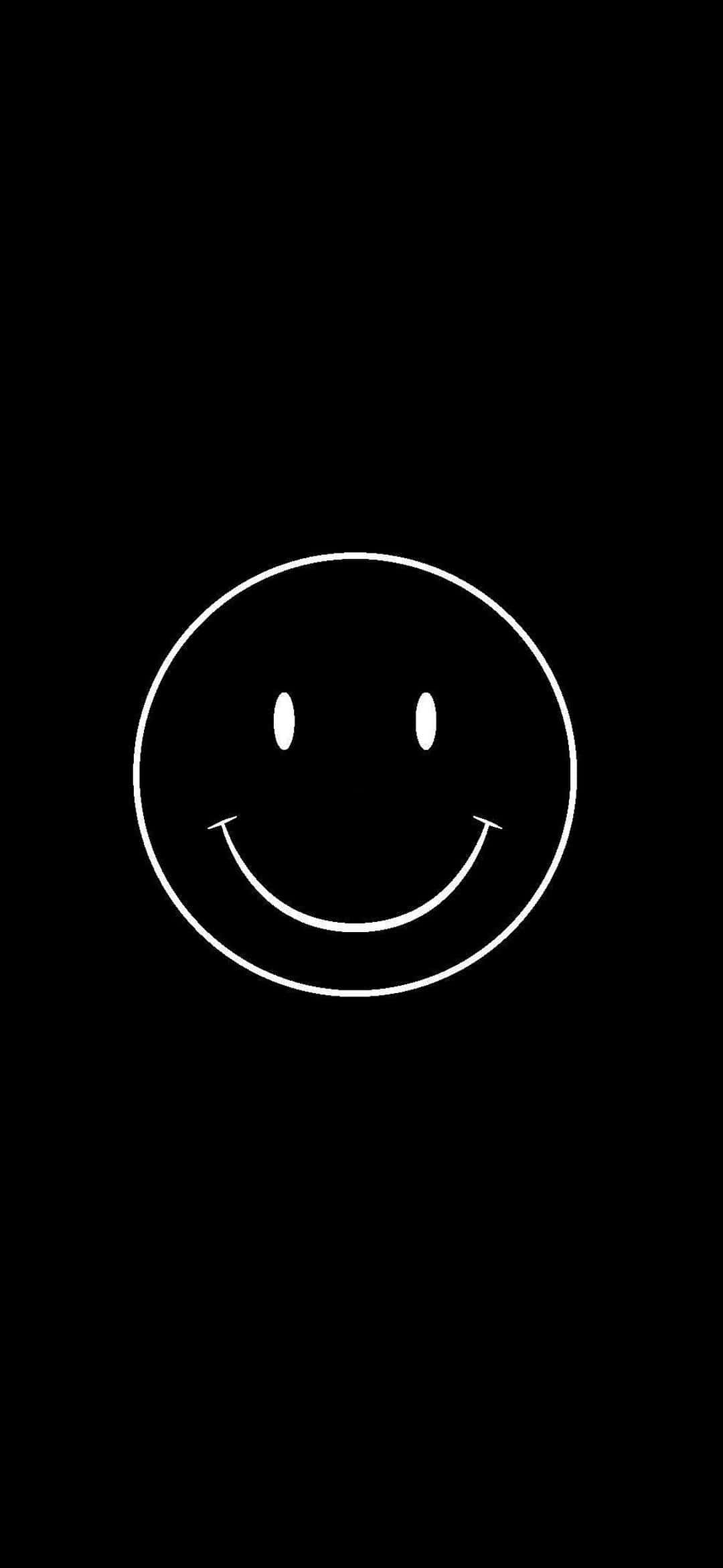 isang puting smiley face sa isang itim na background Wallpaper