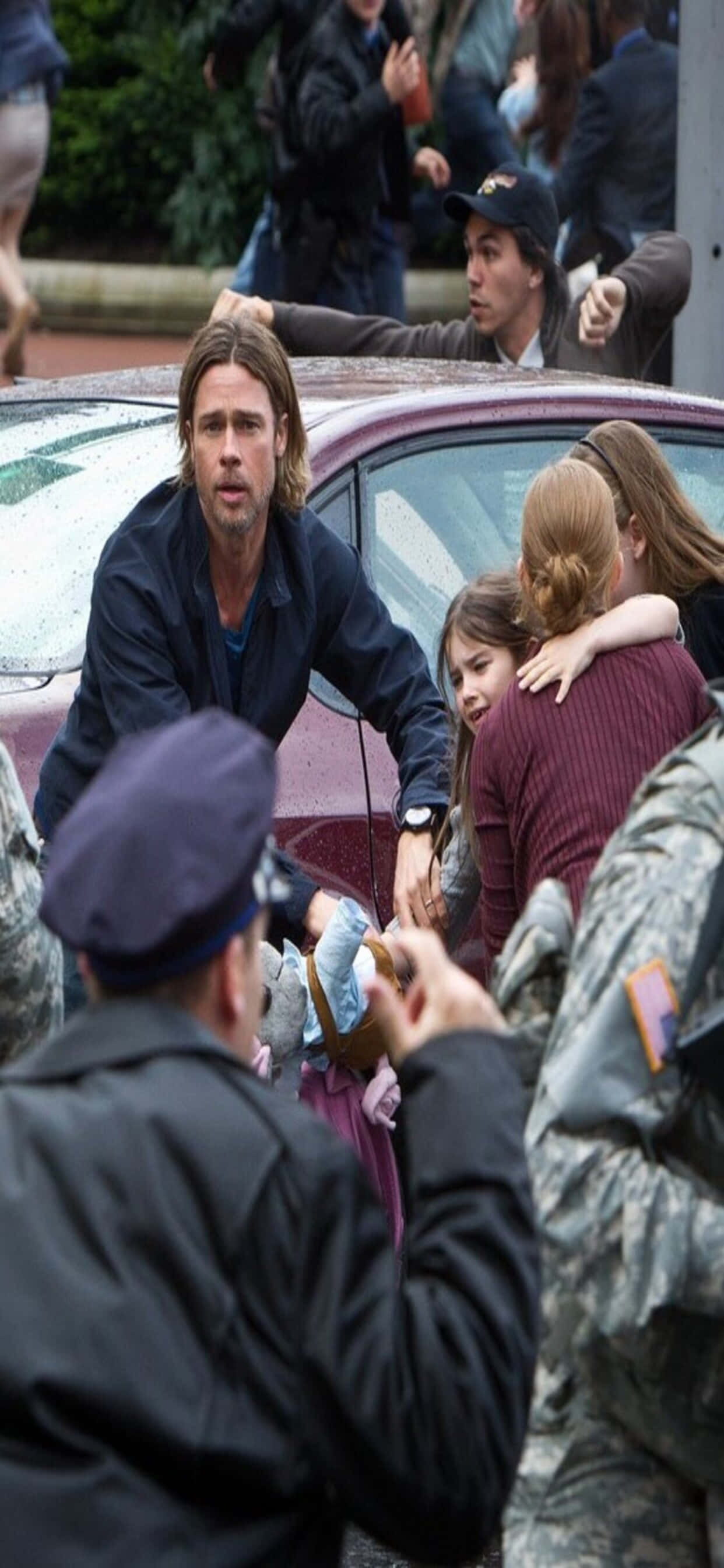 Action-packed Scenery of World War Z on iPhone XS Max Screen Wallpaper