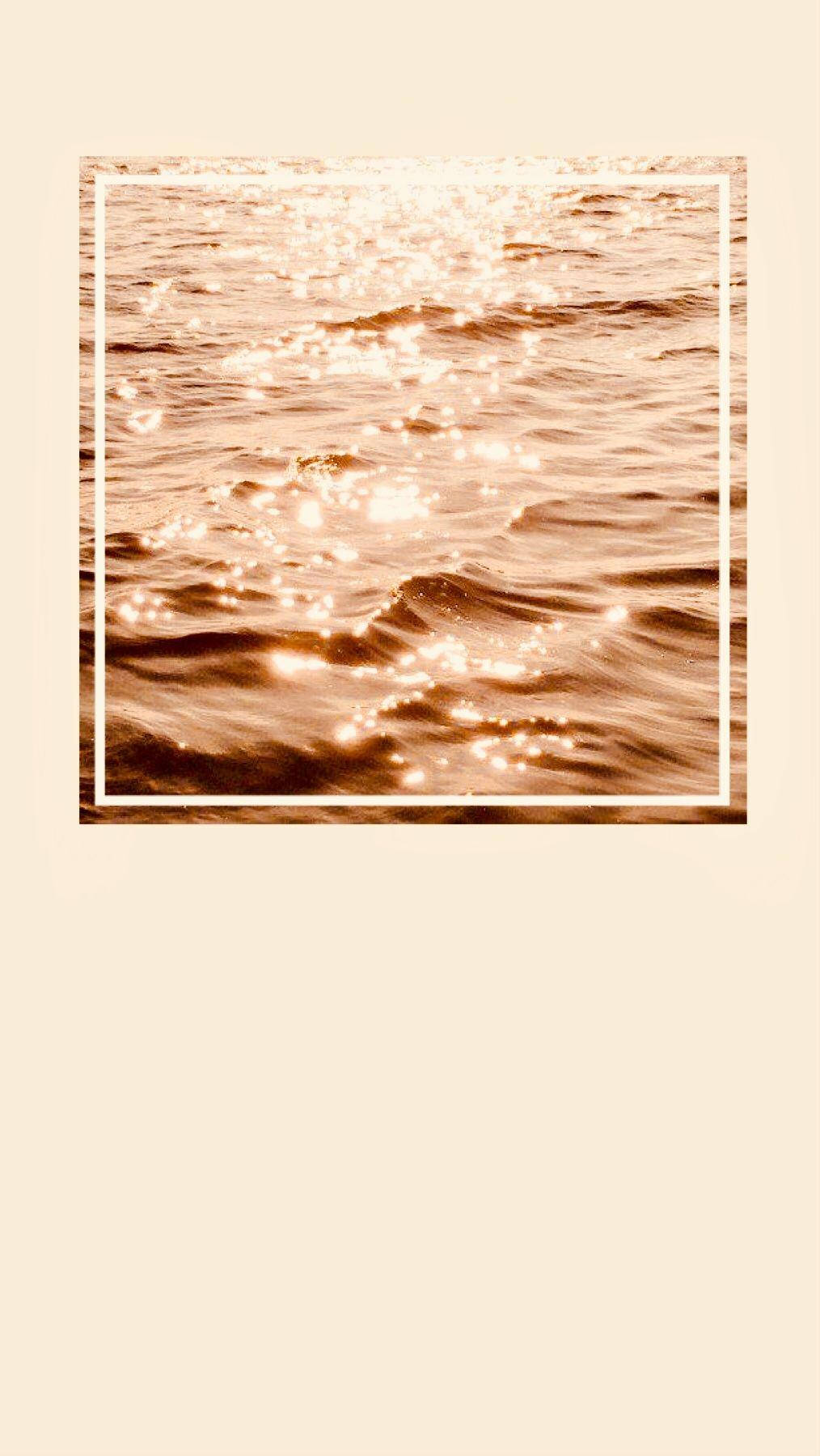 Aesthetic na Kulay Light Brown na Karagatan Wallpaper