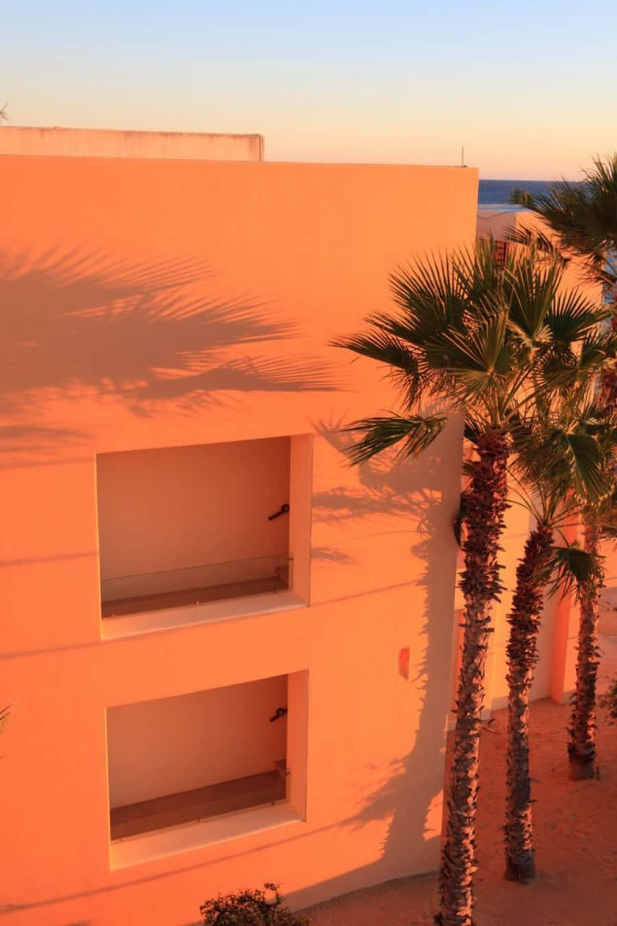 Aesthetic orange wallpaper laban sa madilim na background Wallpaper