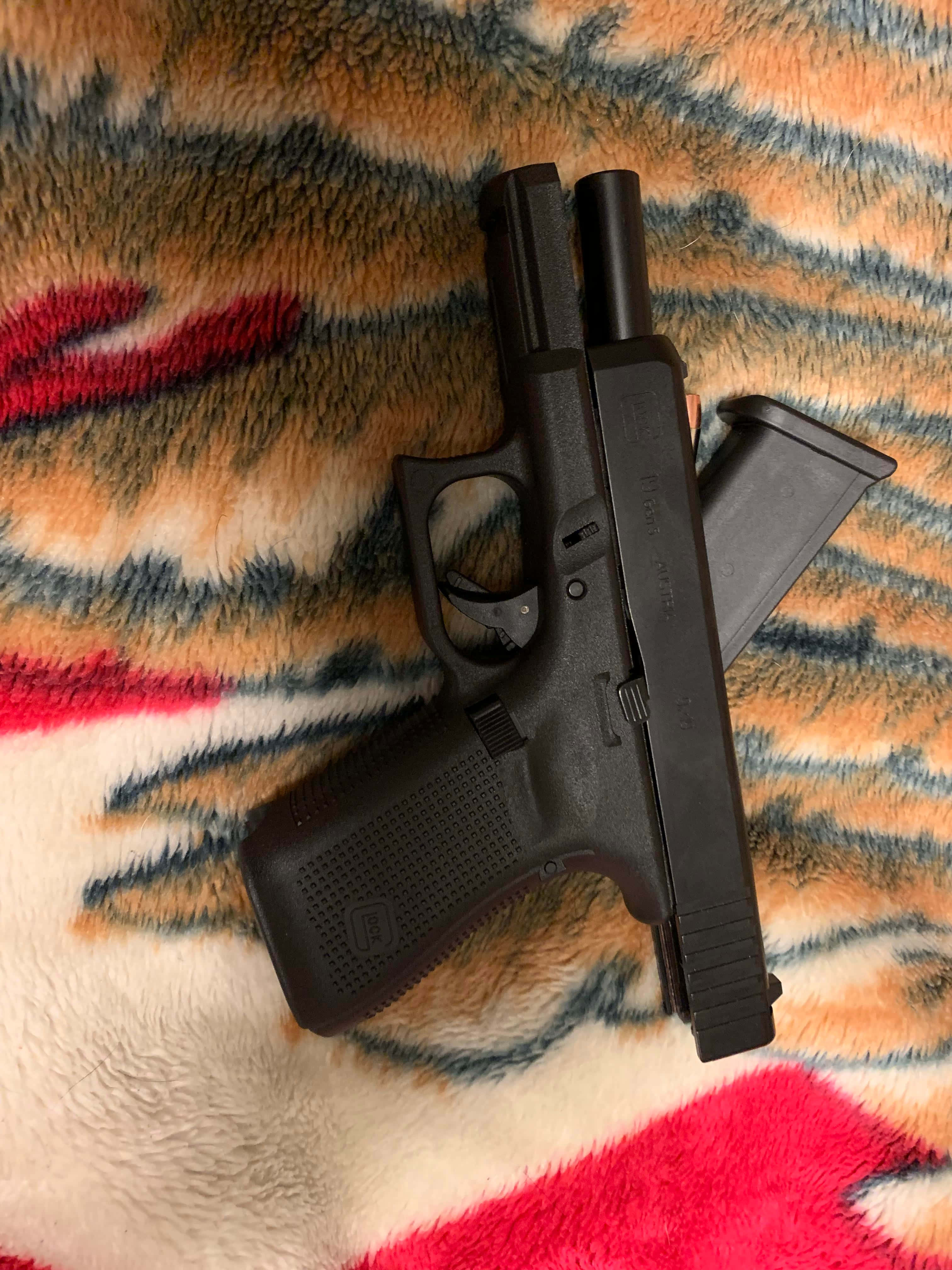 All-Around Pistol Excellence - Glock 19 Wallpaper