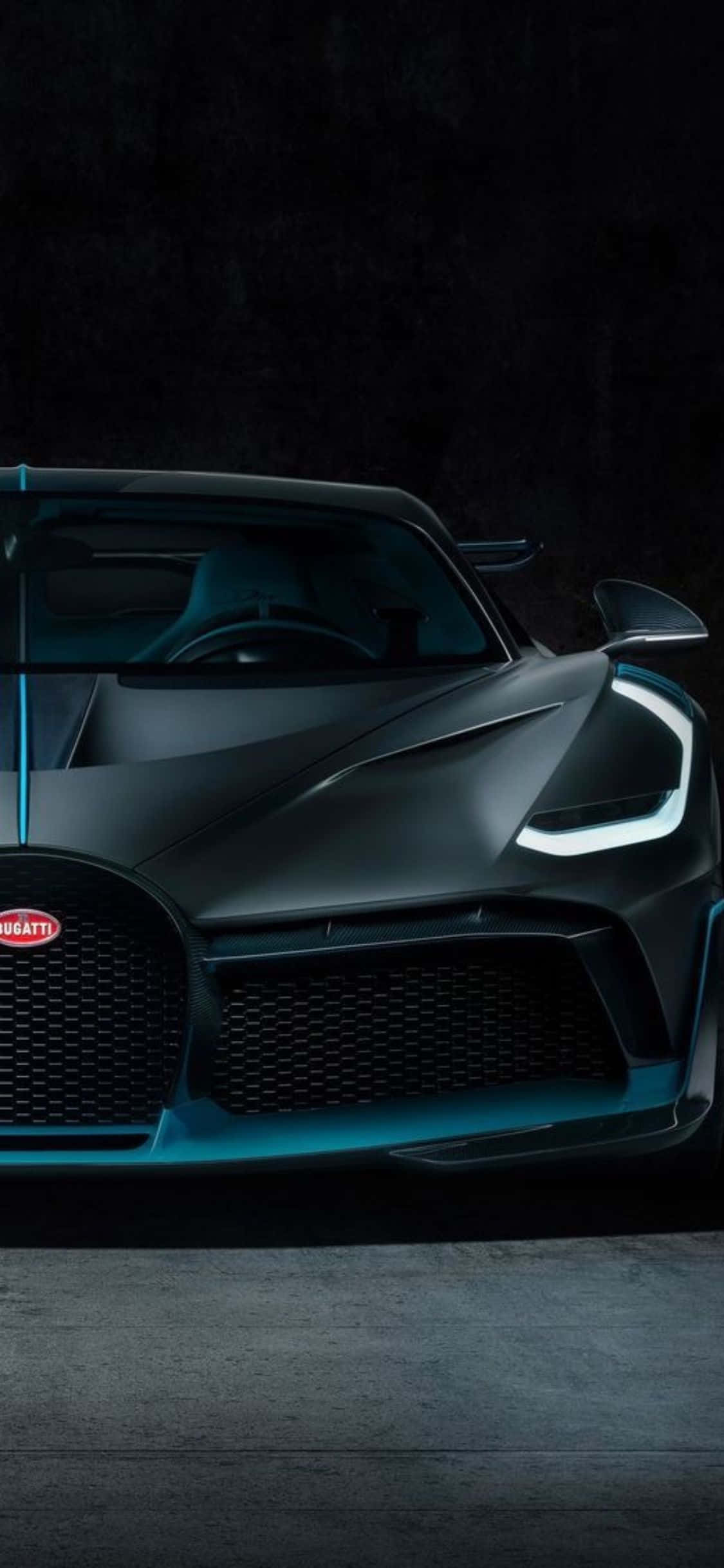 ang bugatti chiron ay ipinapakita sa isang madilim na kuwarto Wallpaper