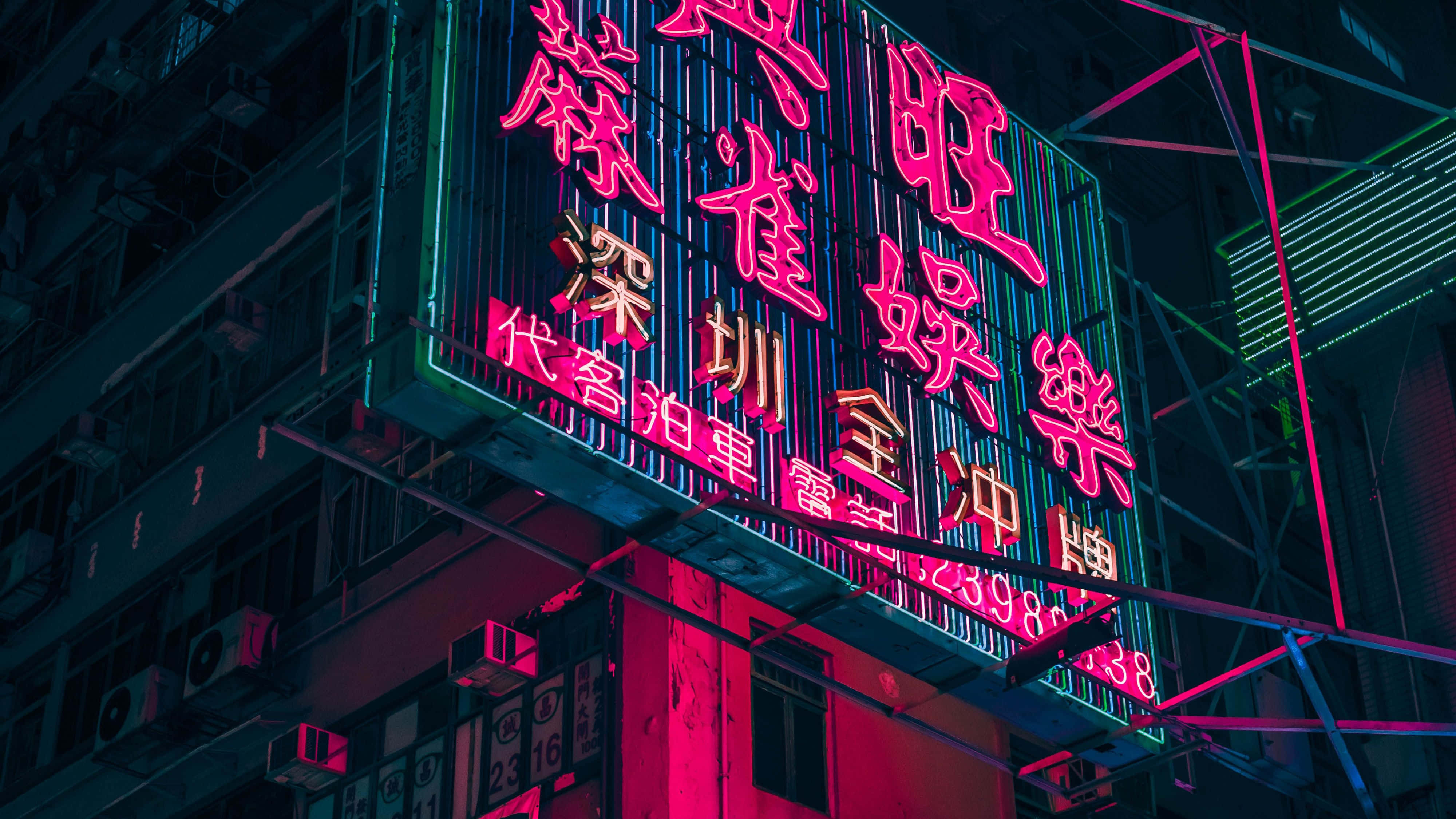 Ang Makukulay na Neon Lights ng Isang Masiglang Metropolis Wallpaper