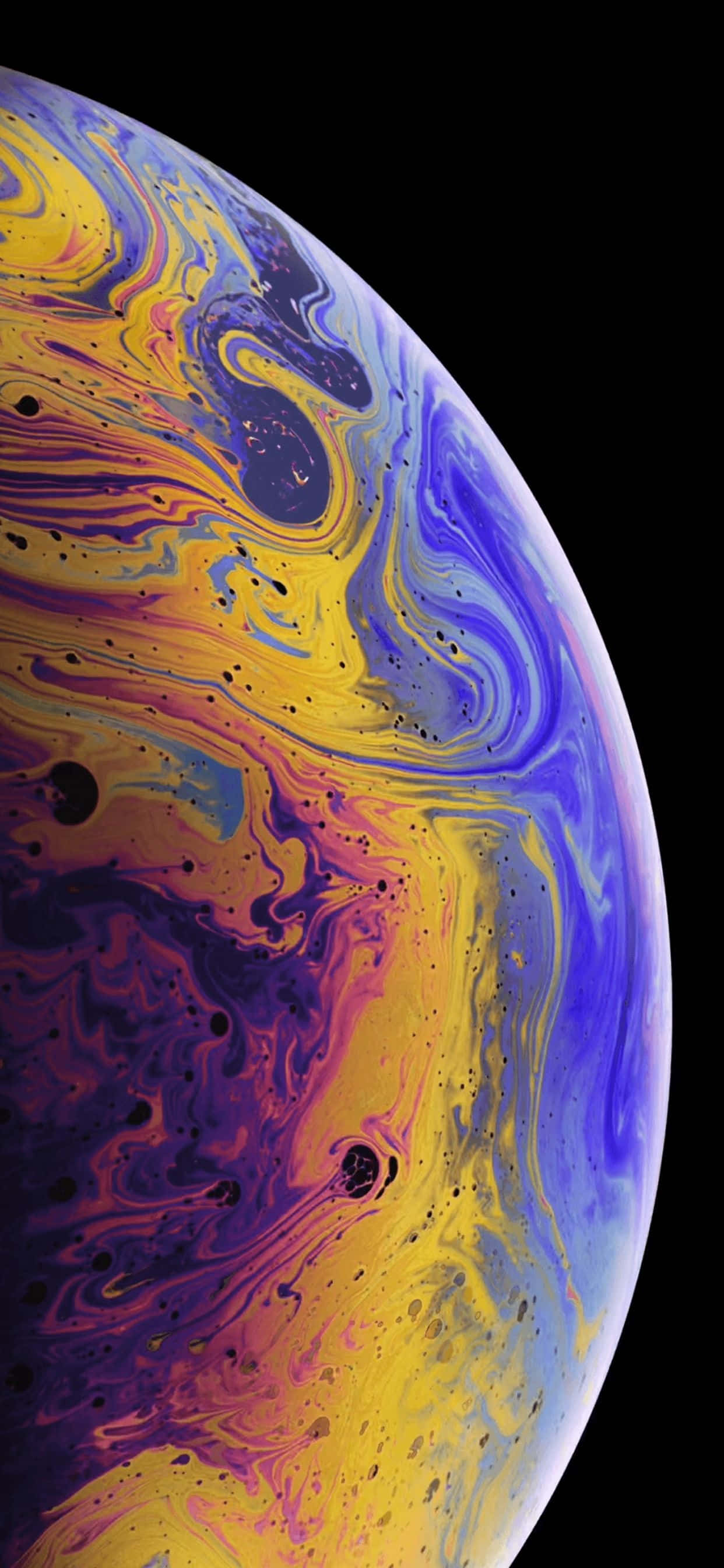 Apple iPhone Xs Max na may makinis na edge-to-edge na disenyo at OLED Super Retina display Wallpaper