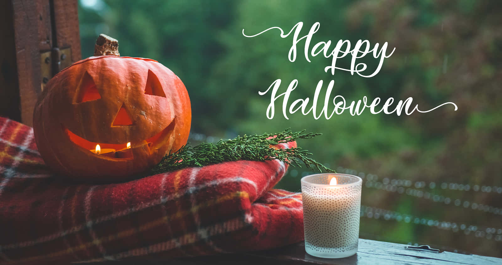 Background ng Halloween na may Pumpkin at Pulang Kumot Wallpaper