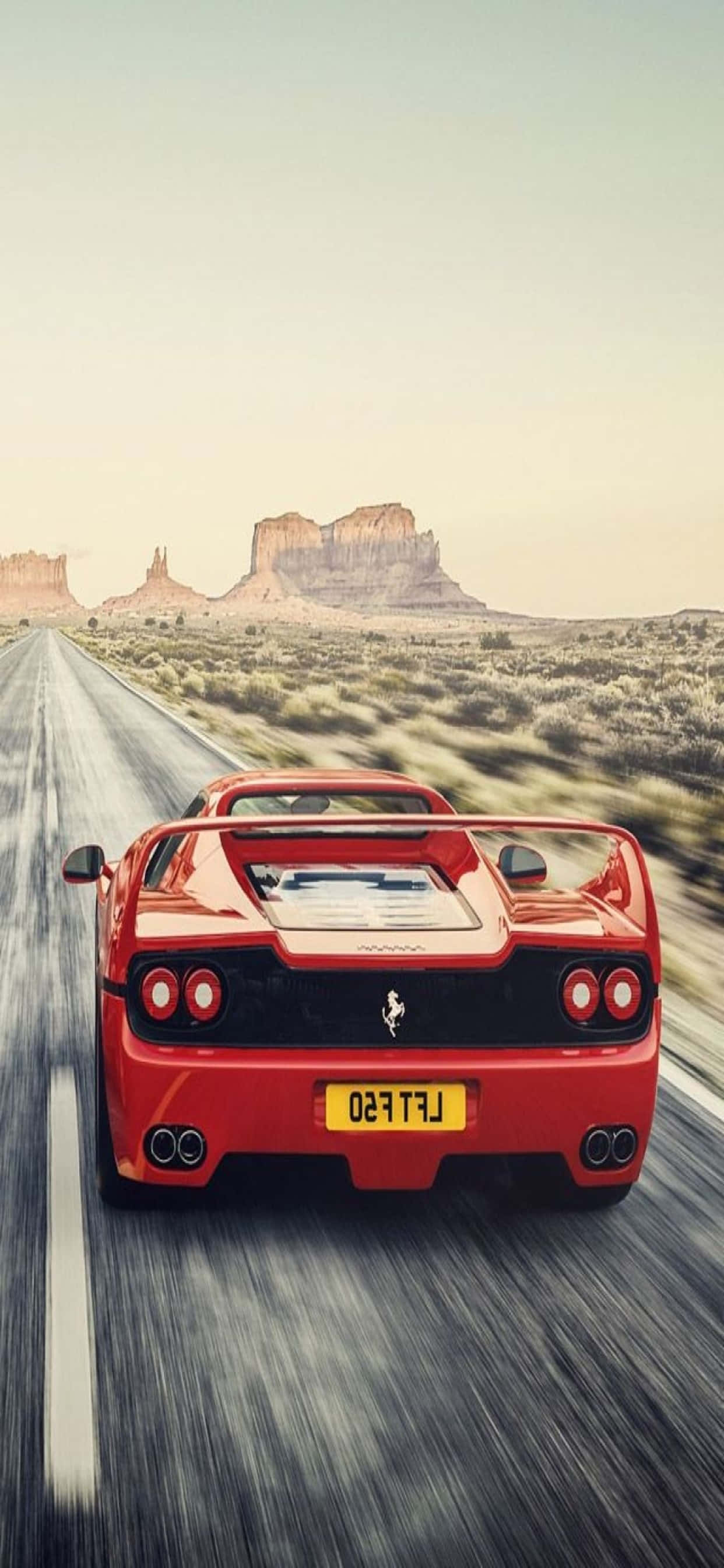 Background ng iPhone Xs Max Ferrari Pula na Ferrari F50 Sa Daan Wallpaper