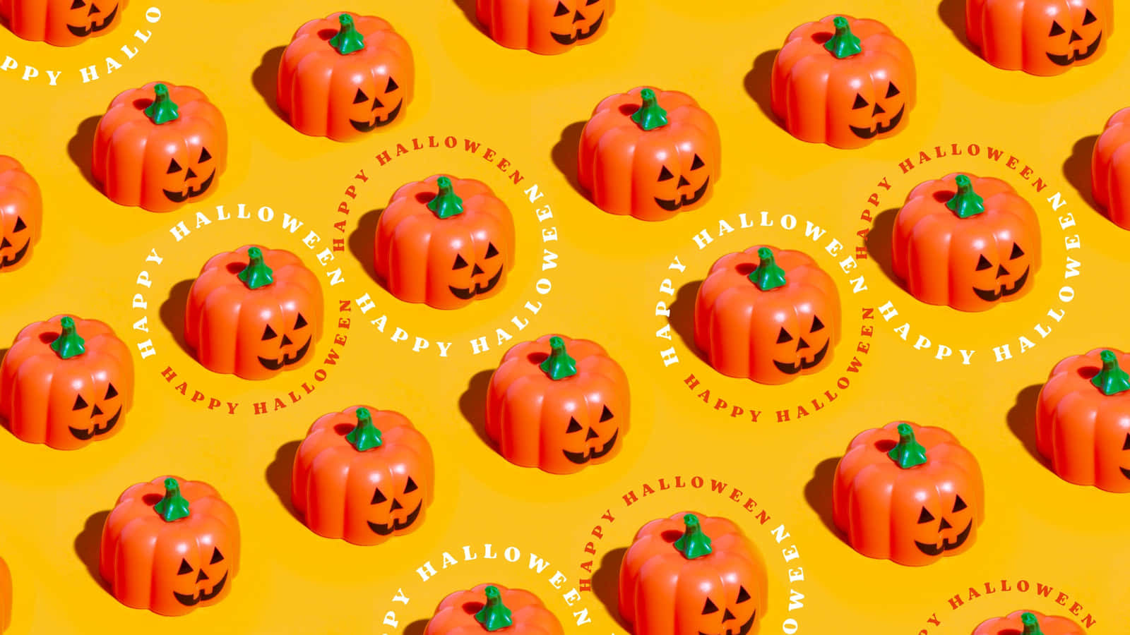 Background ng Kalabasa para sa Masayang Pagbati sa Halloween Wallpaper