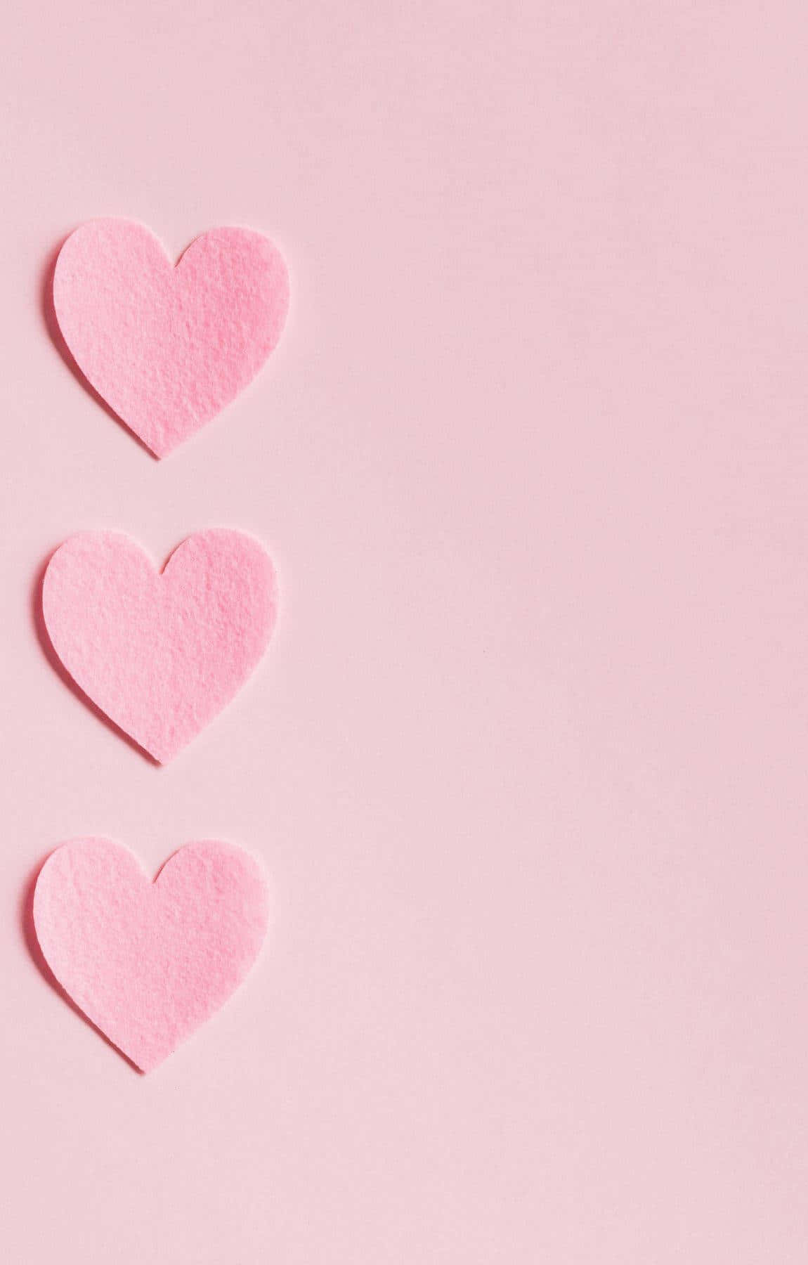 Background ng Mga Pusong Pink na May Textured na Papel Wallpaper