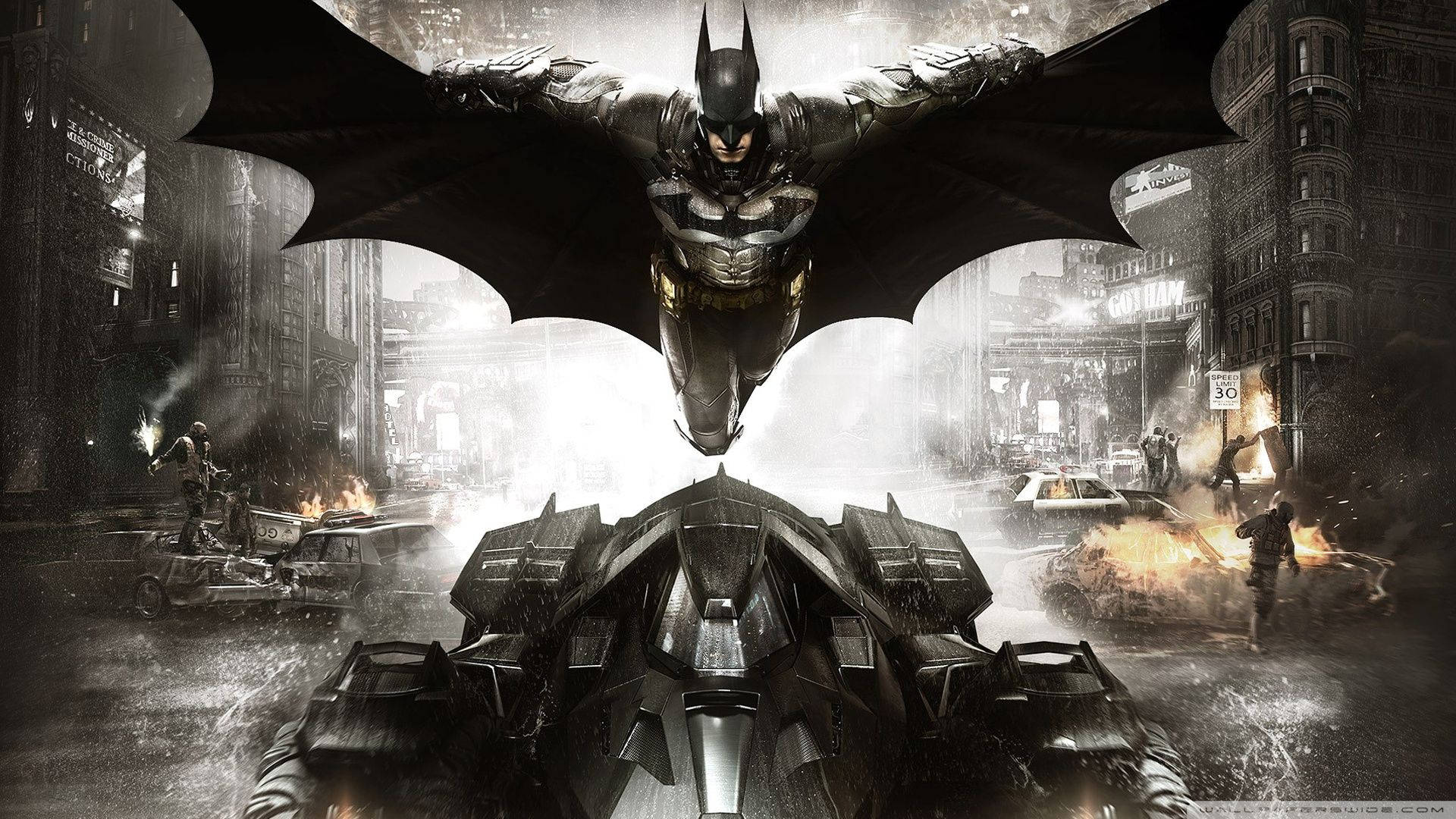 Batman na Lumilipad sa Ibabaw ng Batmobile Wallpaper