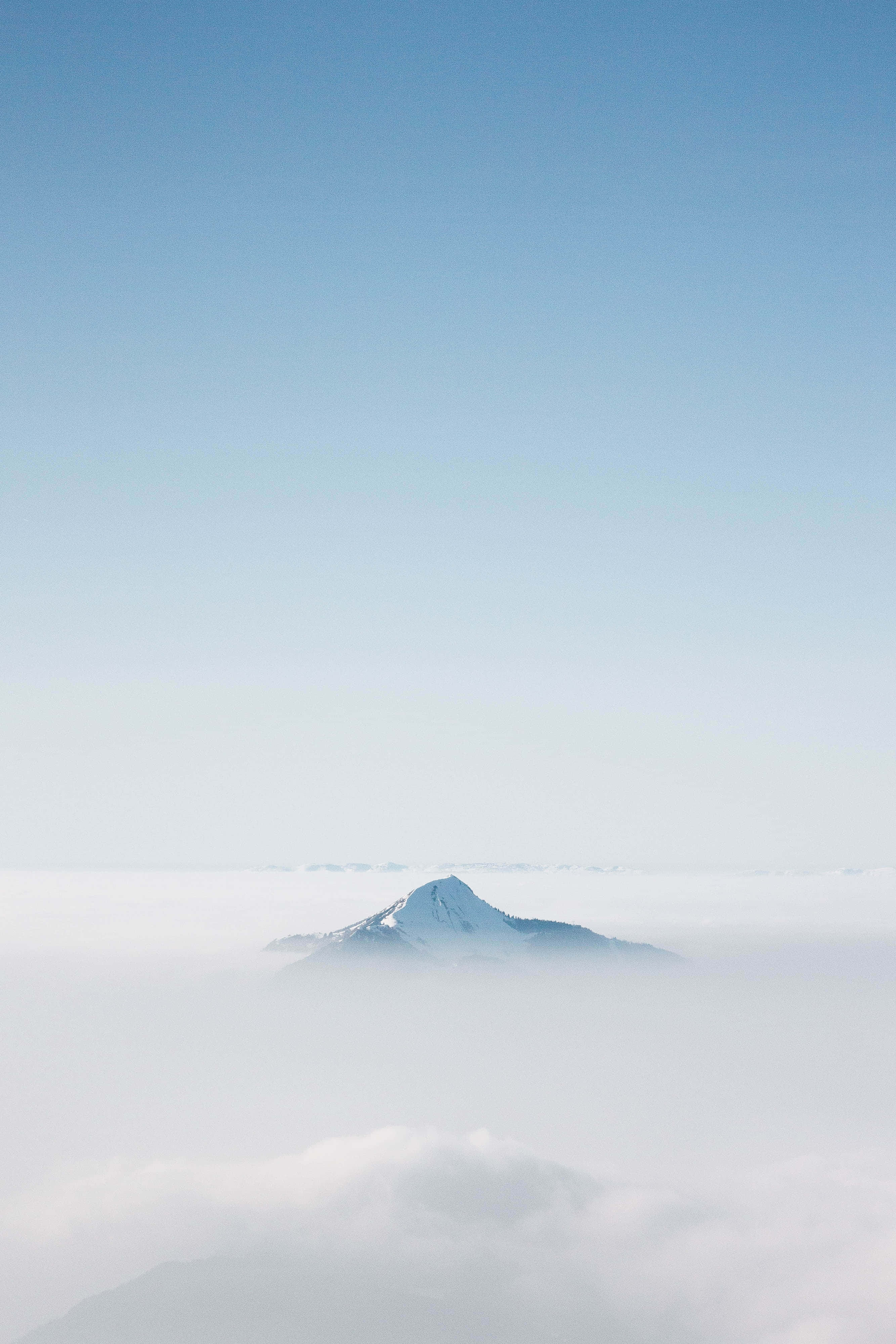 Blue Aesthetic Background Mountain Through The Clouds Wallpaper