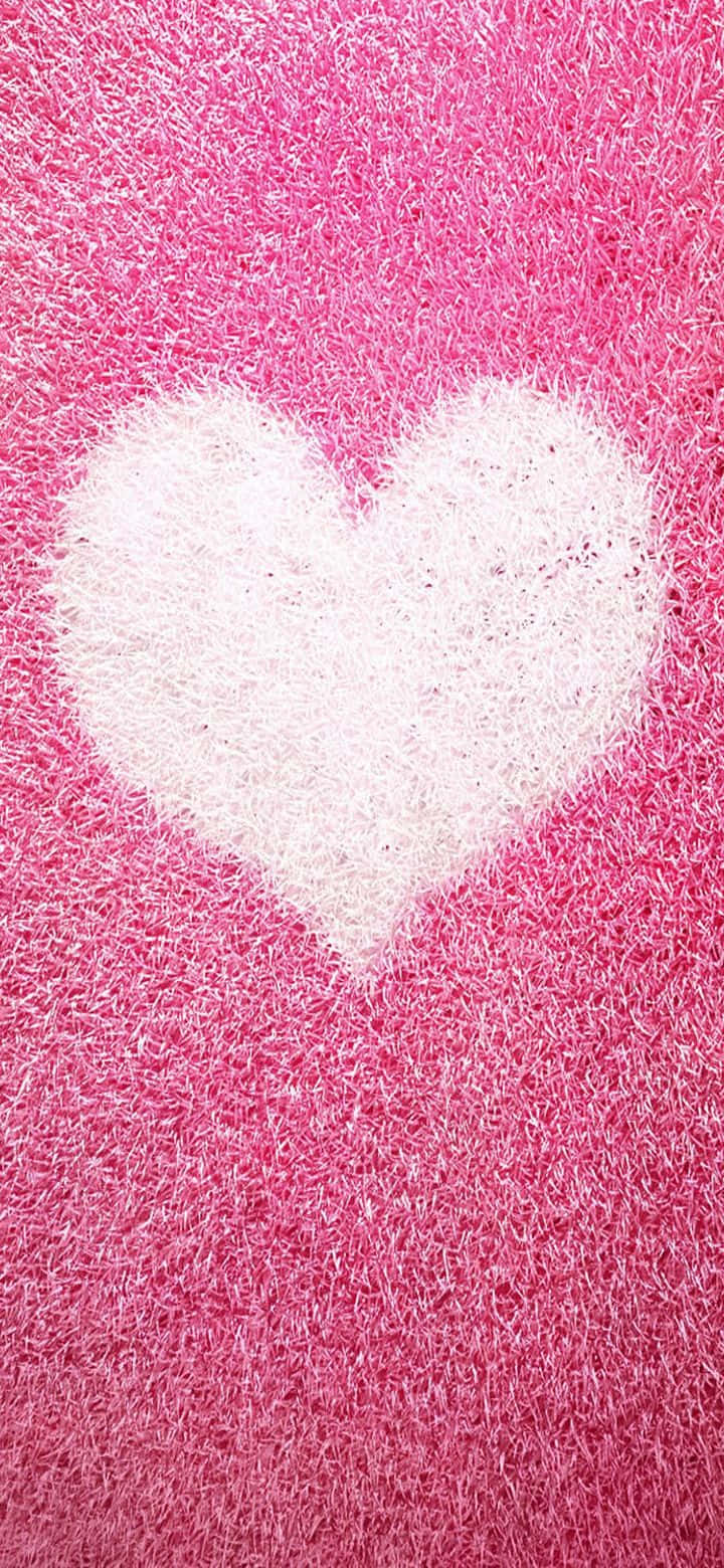 Blushing Love - Isang Delicate Pink Heart Background Wallpaper