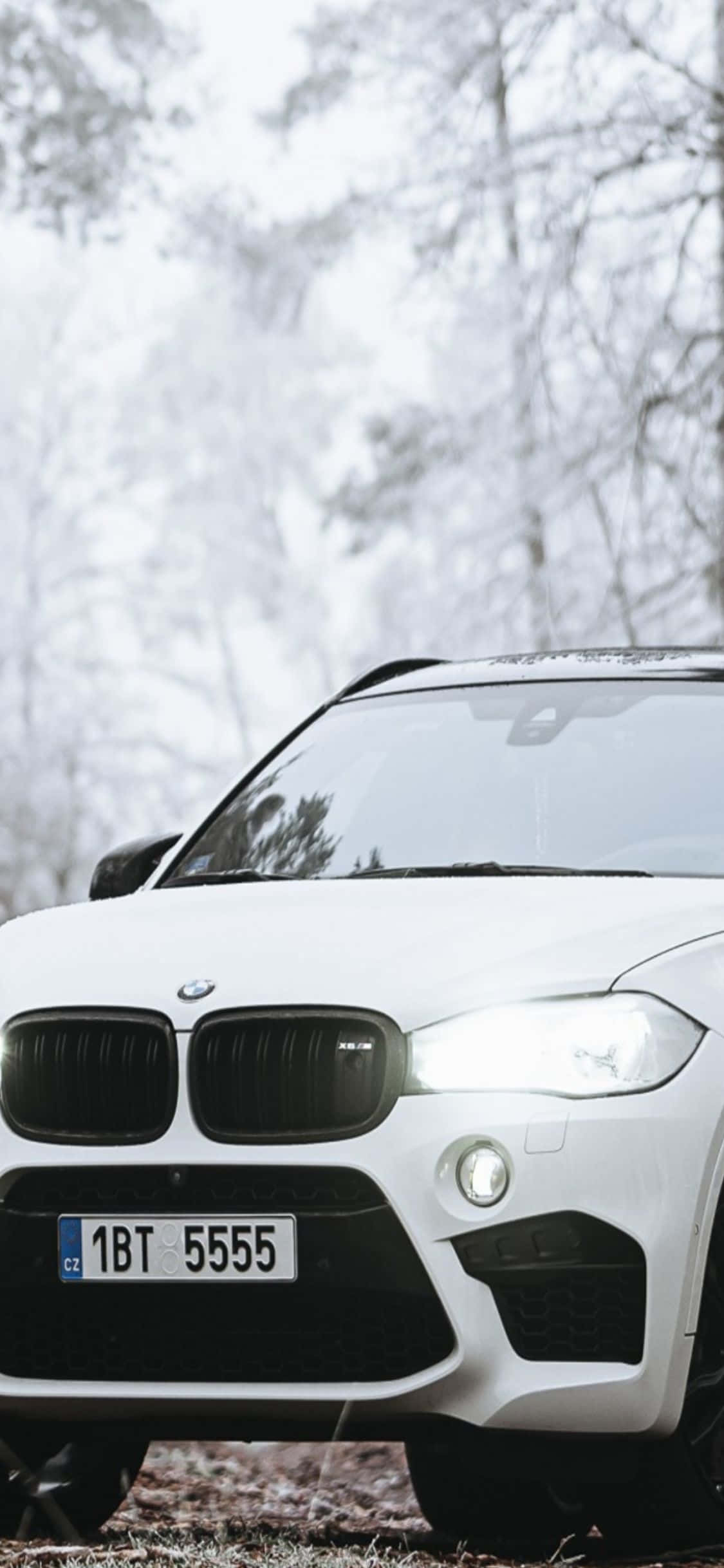 Bmw at iPhone X, ang perpektong kombinasyon para sa taong mahilig sa teknolohiya. Wallpaper