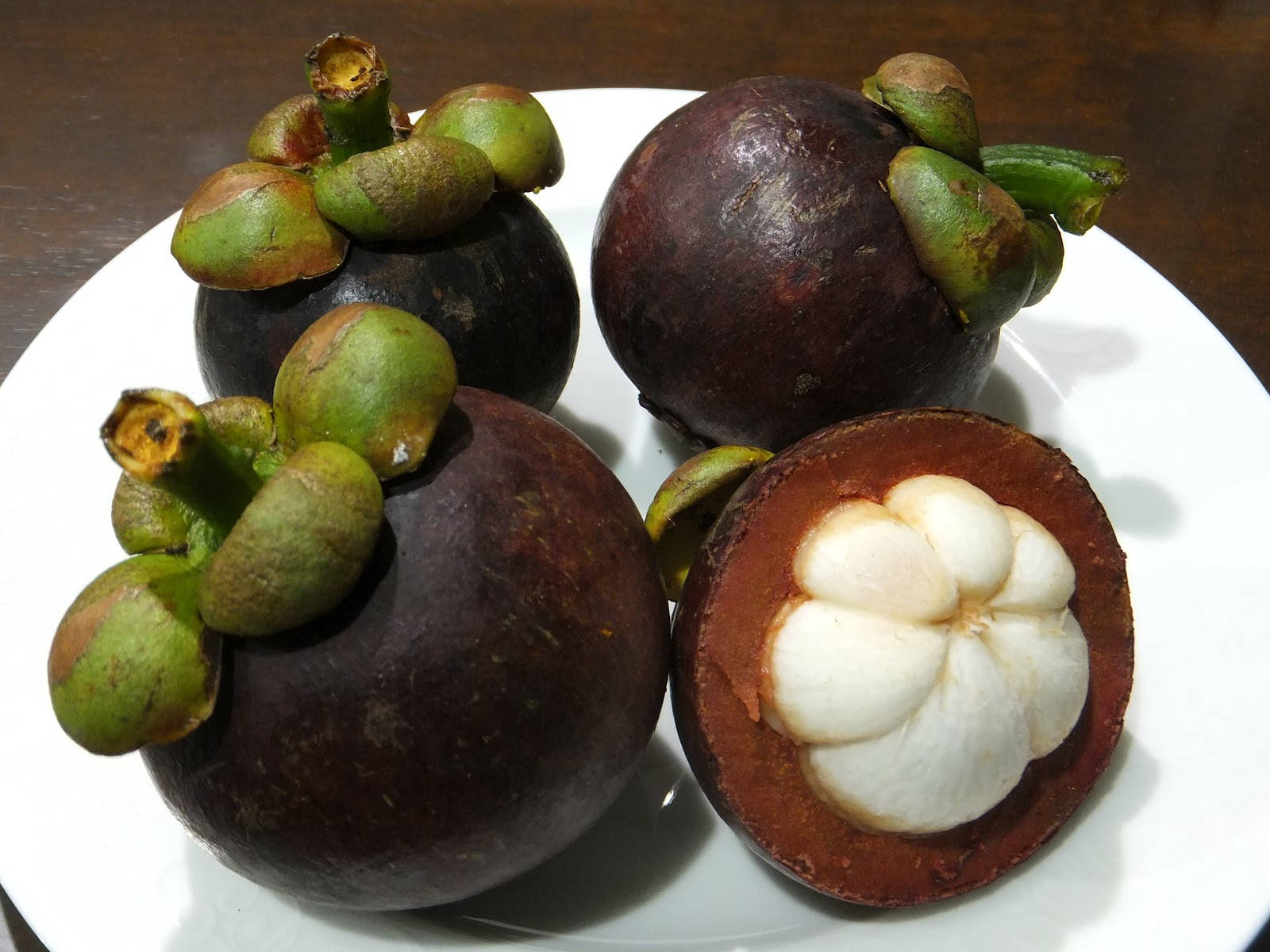 Caption: Masaganang Mangosteen na prutas mula sa Costa Rica Wallpaper