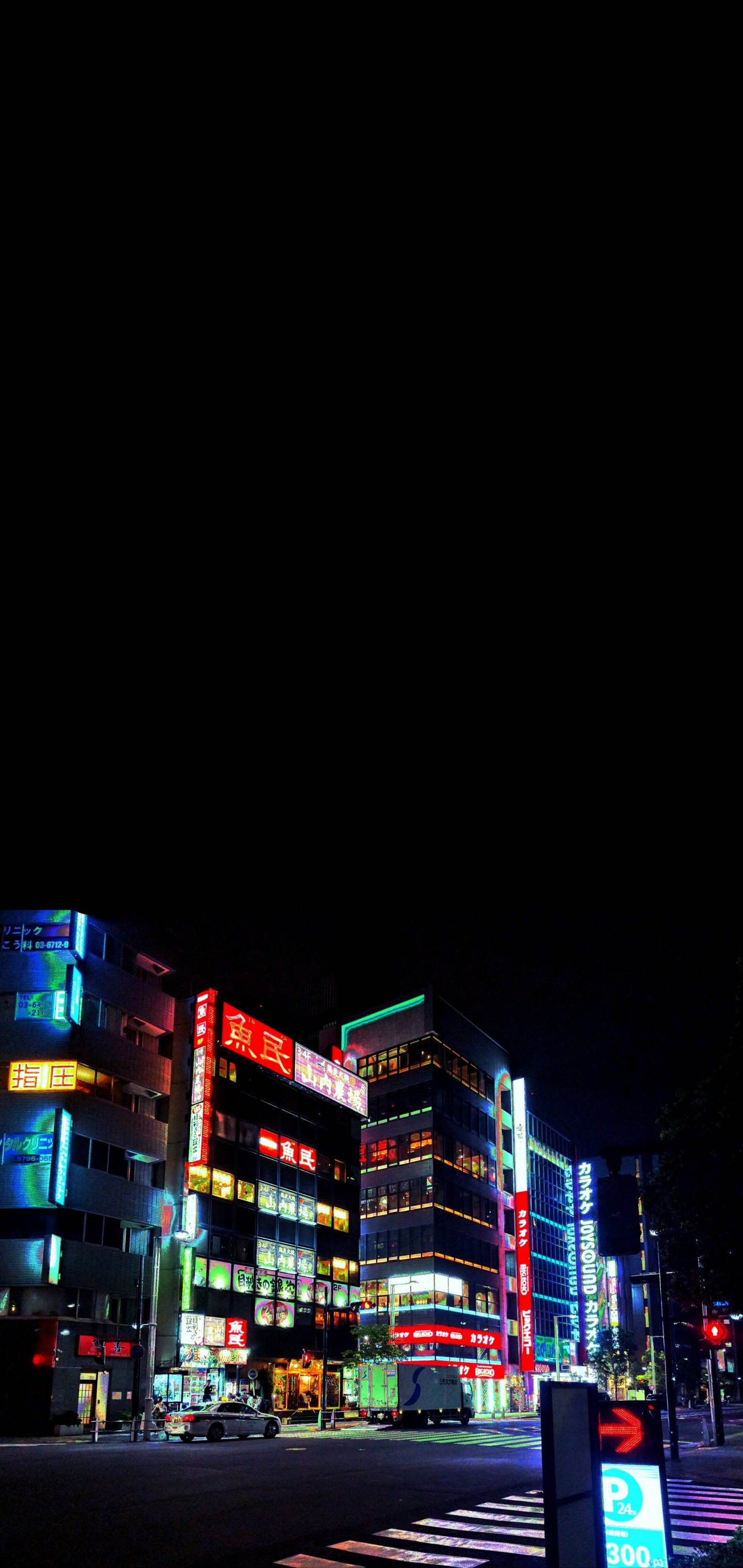 Cool na iPhone 11 Tokyo sa Gabi Wallpaper