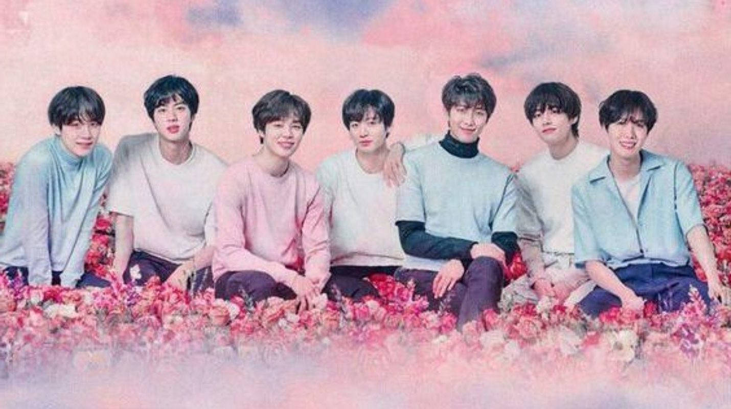 Cute BTS Group Sa Isang Pink na Flower Field Wallpaper