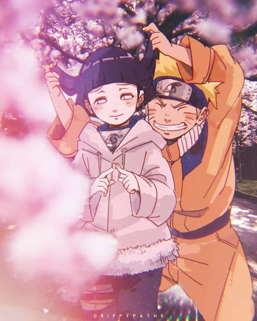 Cute Naruto at Hinata sa Cherry Blossoms Park Wallpaper