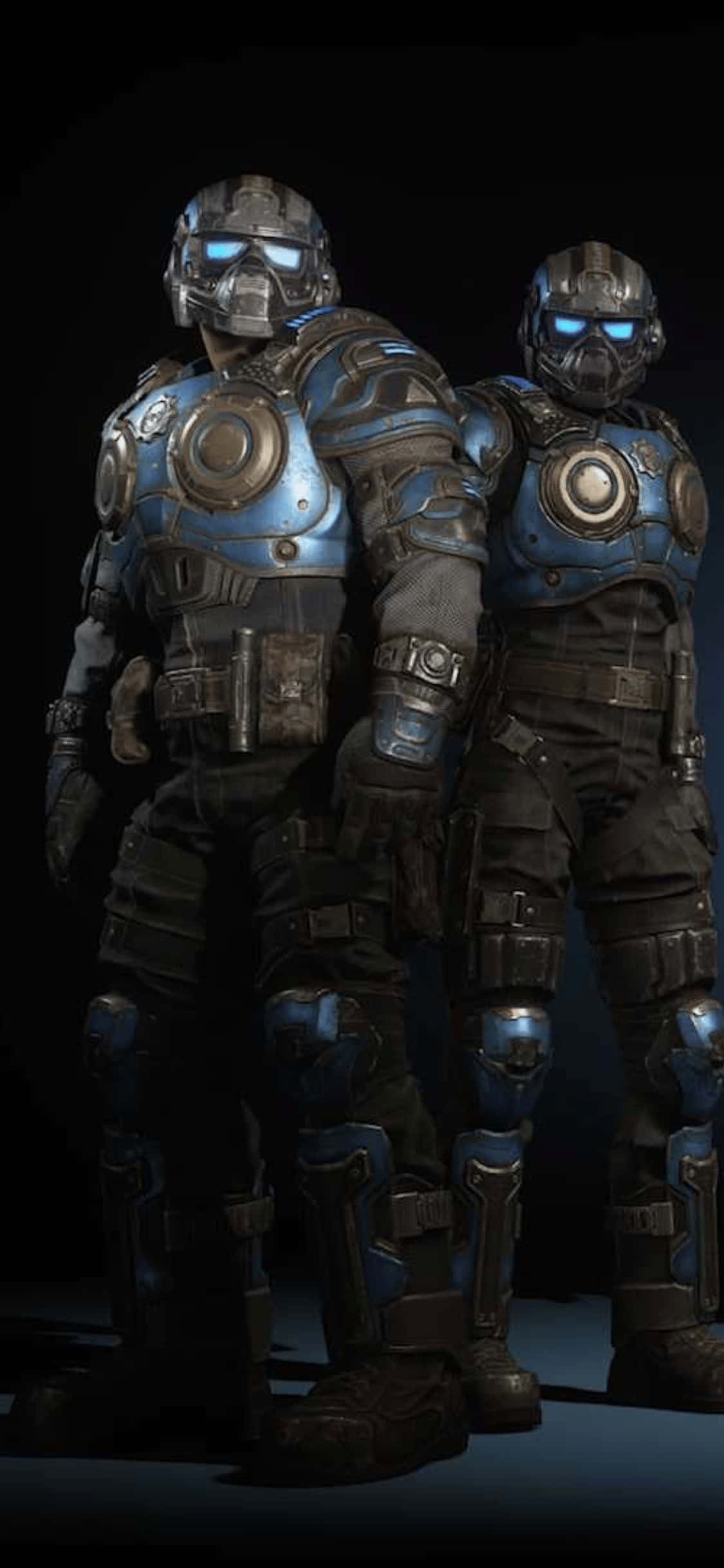 dalawang lalaki na naka-blue gears of war suits na nakatayo sa tabi ng isa't isa Wallpaper