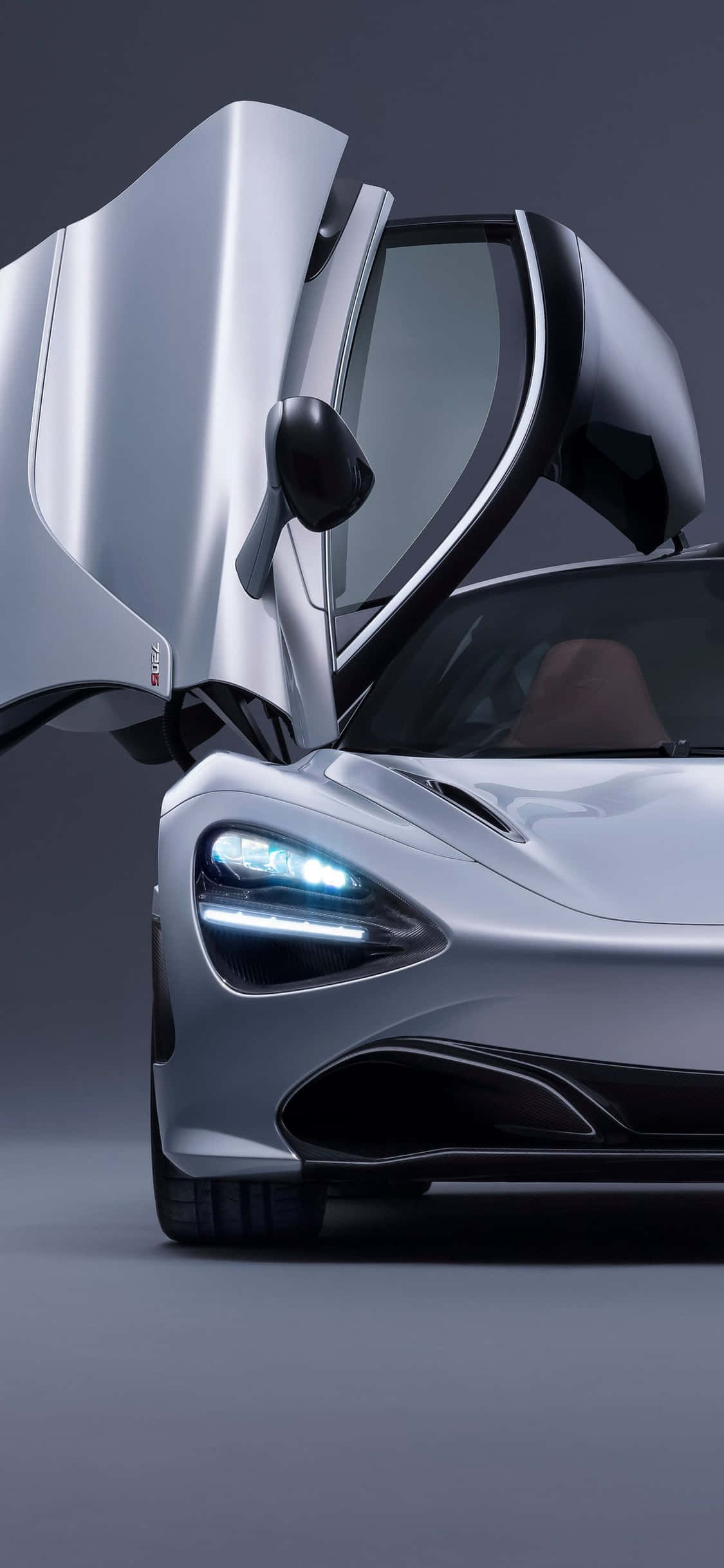 Eksperyensya ang kapangyarihan at bilis ng iPhone Xs kasama ang Mclaren 720s Wallpaper