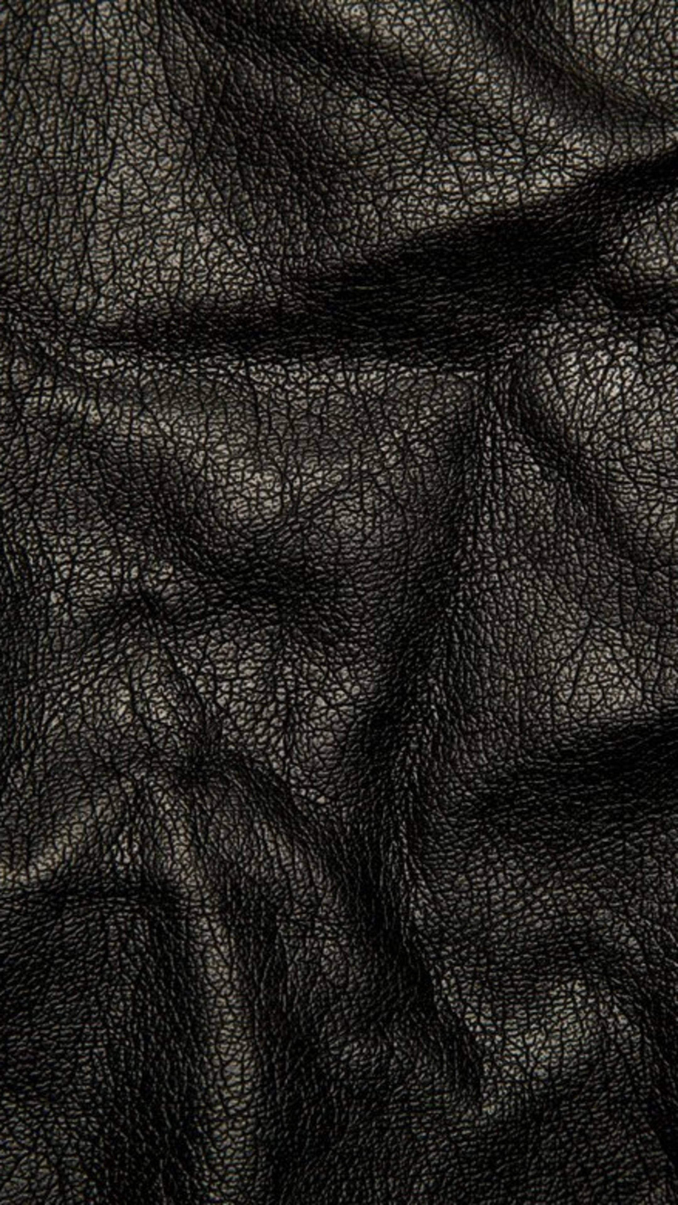 Enigmatic Elegance: Crumpled Leather 4K Ultra HD Dark Phone Wallpaper