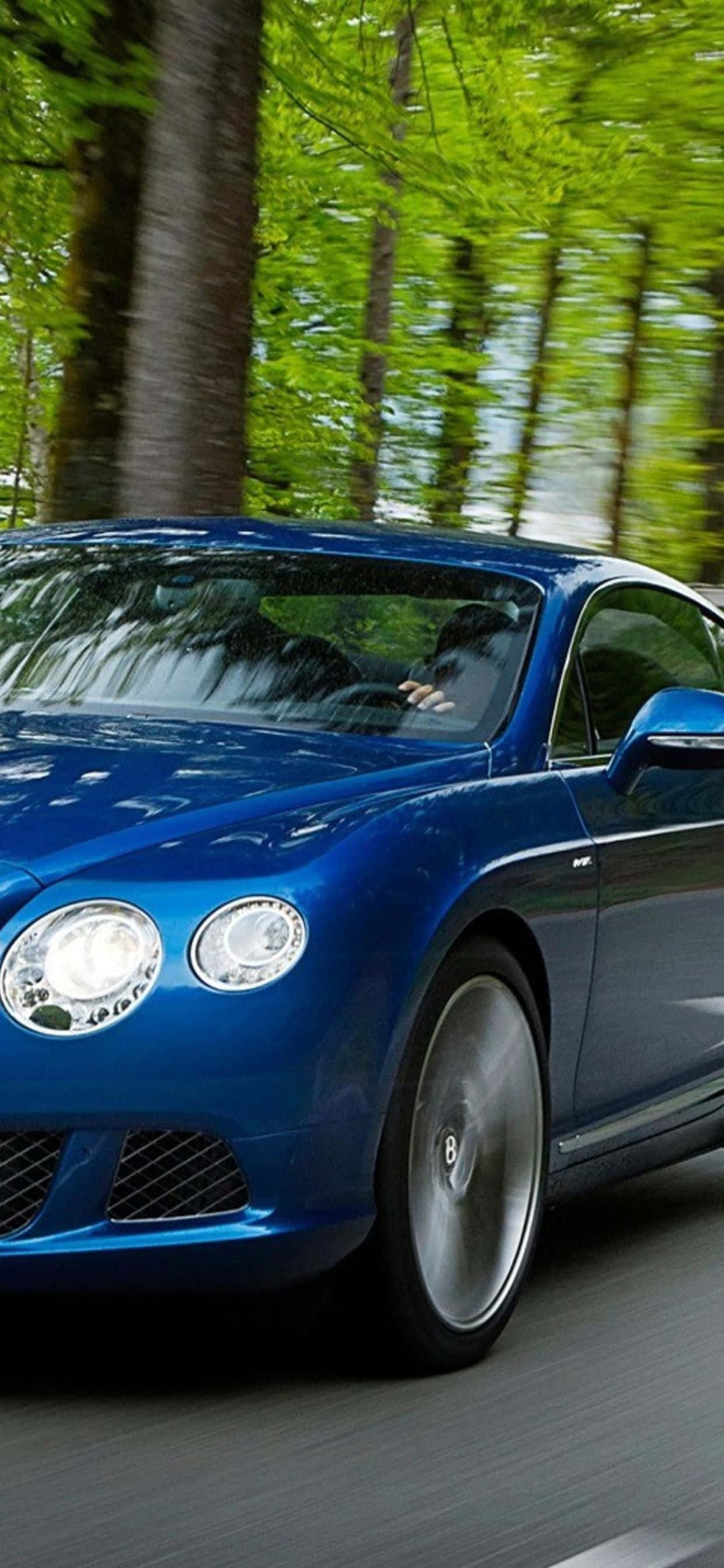 Enjoy ang Buhay sa Max sa Estilo - iPhone Xs Max at isang Bentley Wallpaper