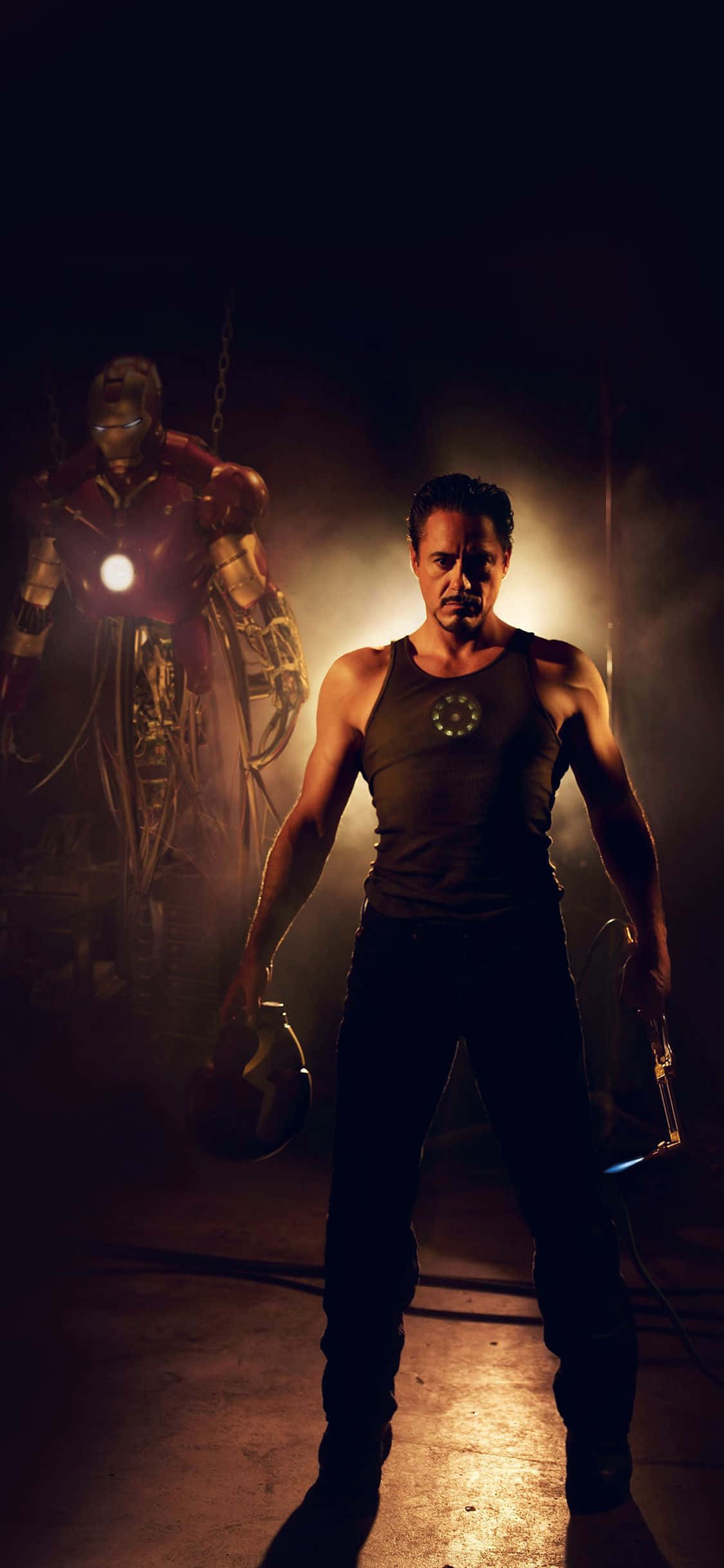 Enter the technological age with Iron Man's Apple iPhone X Wallpaper