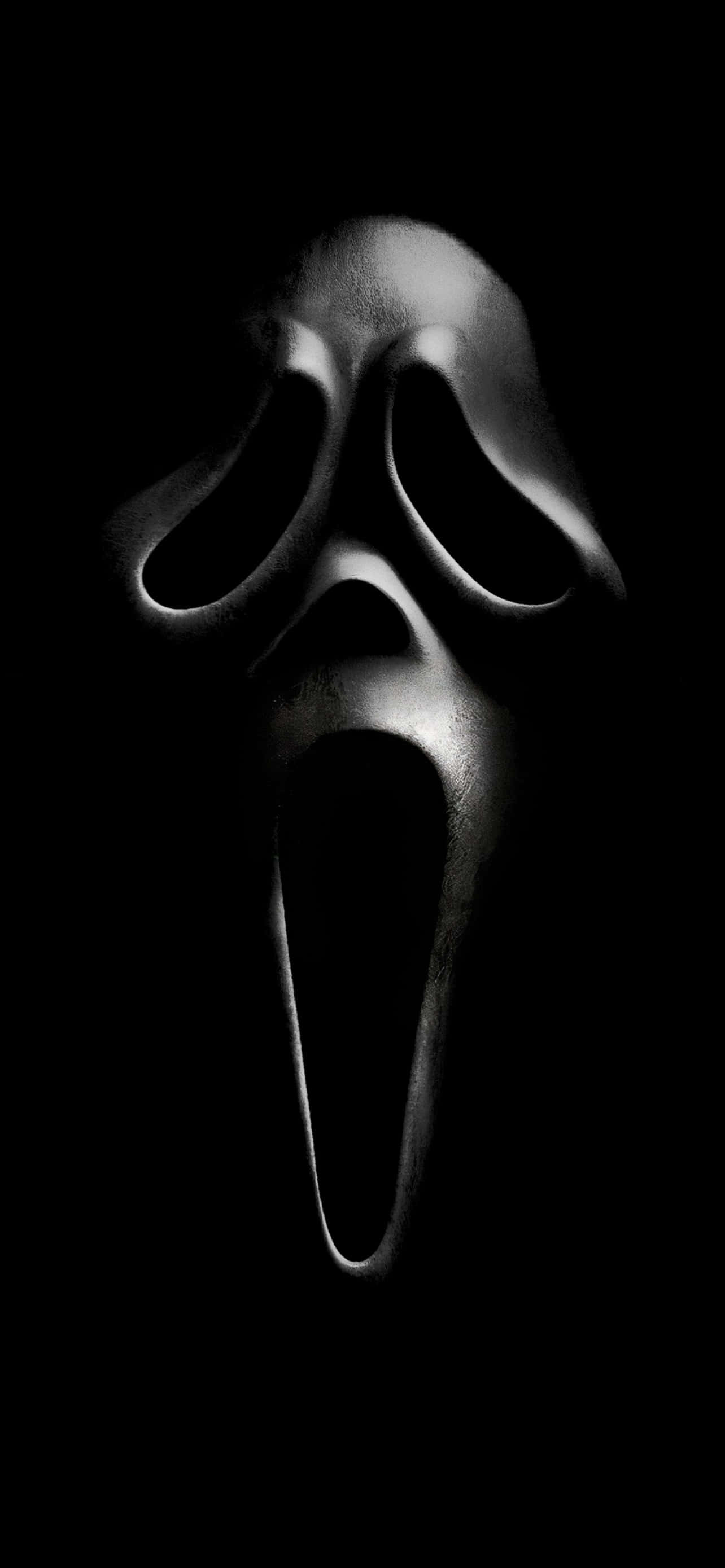 Ghostface, ang Serial Killer mula sa Scream Franchise Wallpaper