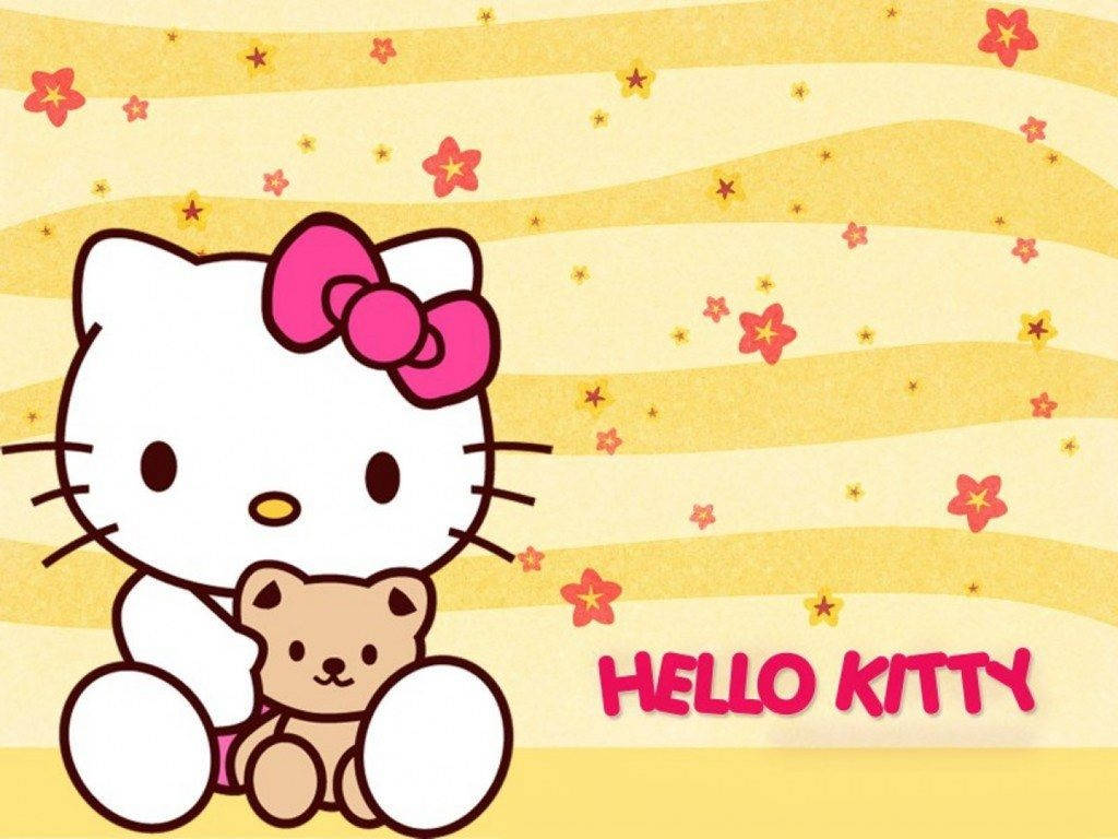 Hello Kitty sa Cute na Dilaw na Background Wallpaper