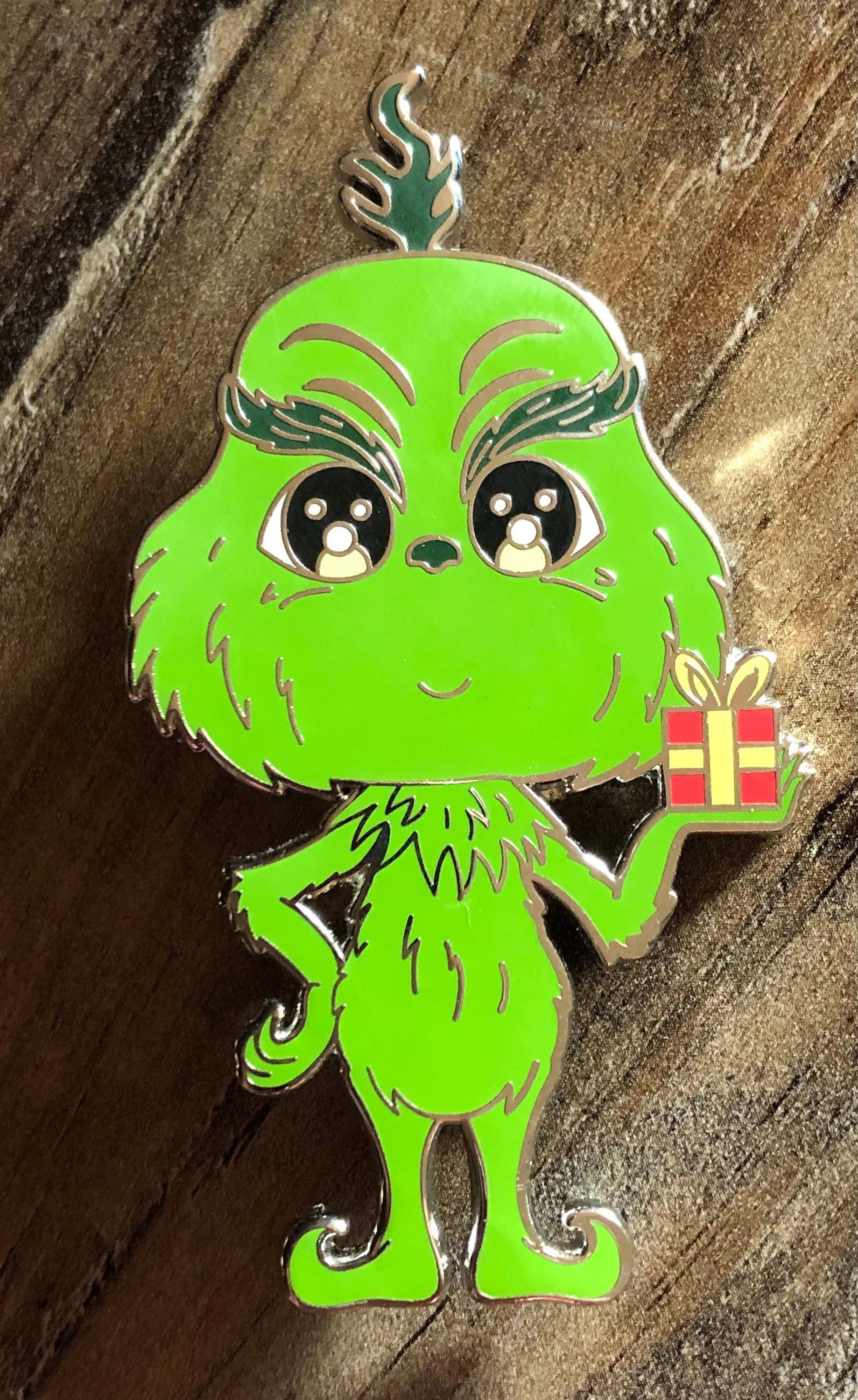 Ikalat ang diwa ng Pasko kasama ang nakatutuwang Grinch! Wallpaper