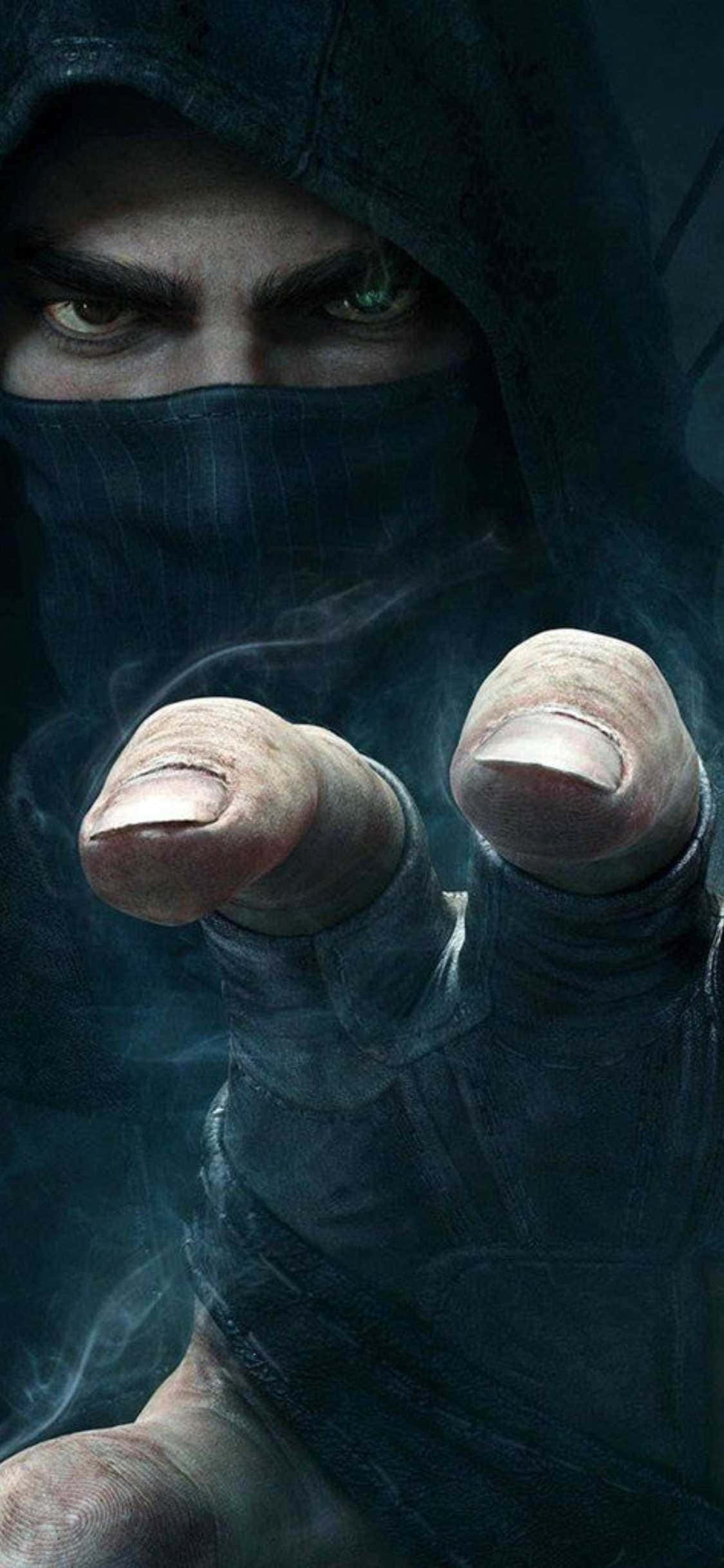 Imahen Isang Magnanakaw na Nahuli na Nagbabasag ng iPhone Xs Wallpaper