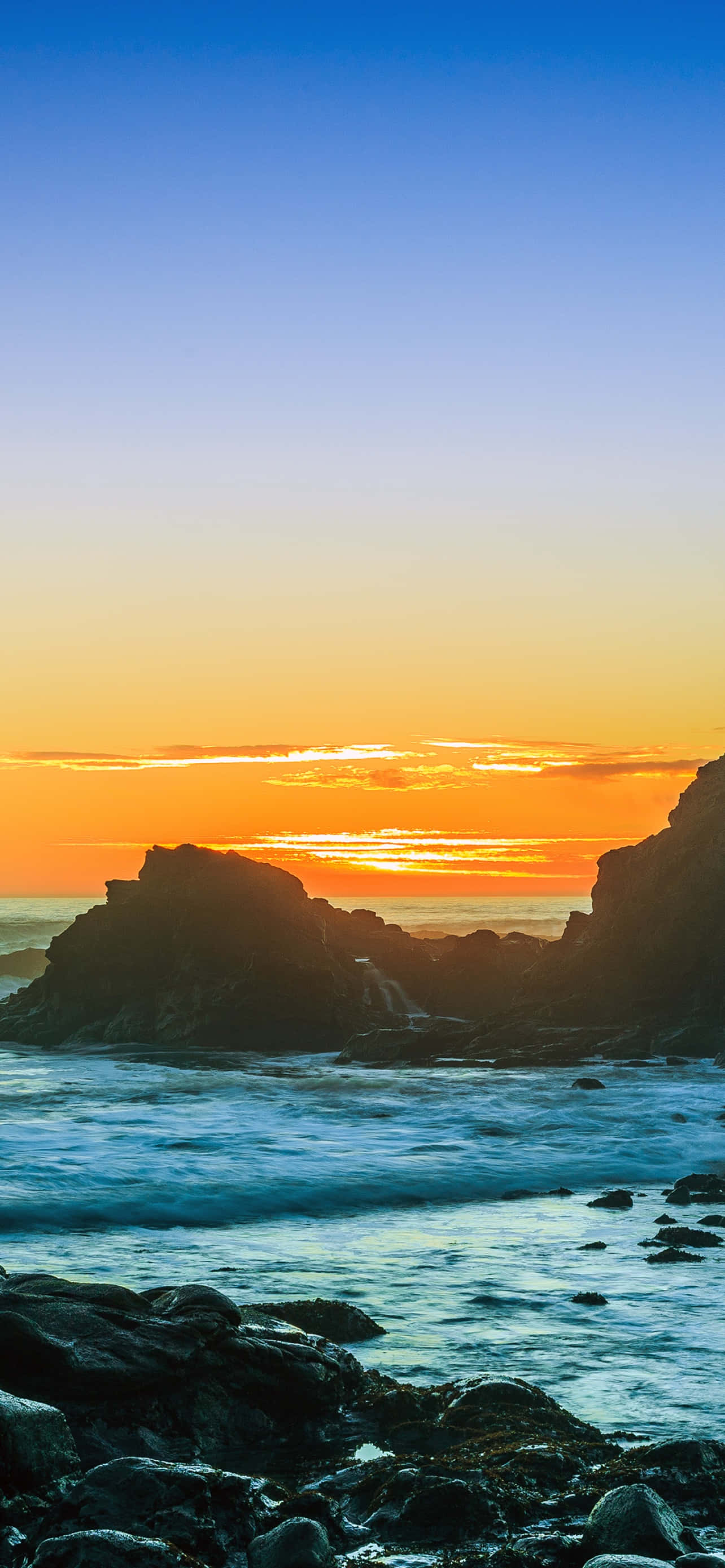 iPhone X Malibu Background Blue & Orange Sky Wallpaper
