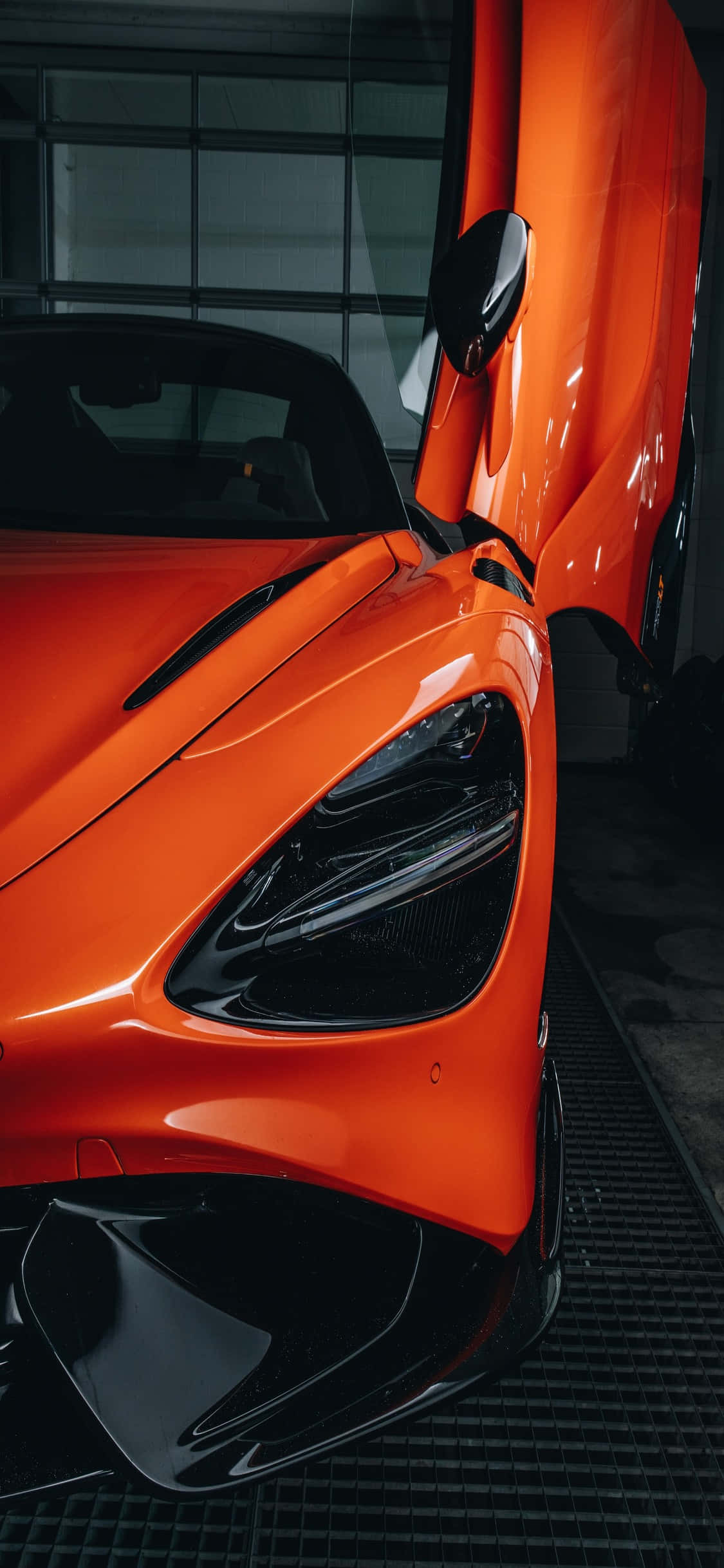 iPhone X Mclaren 720s Orange Door Background Wallpaper