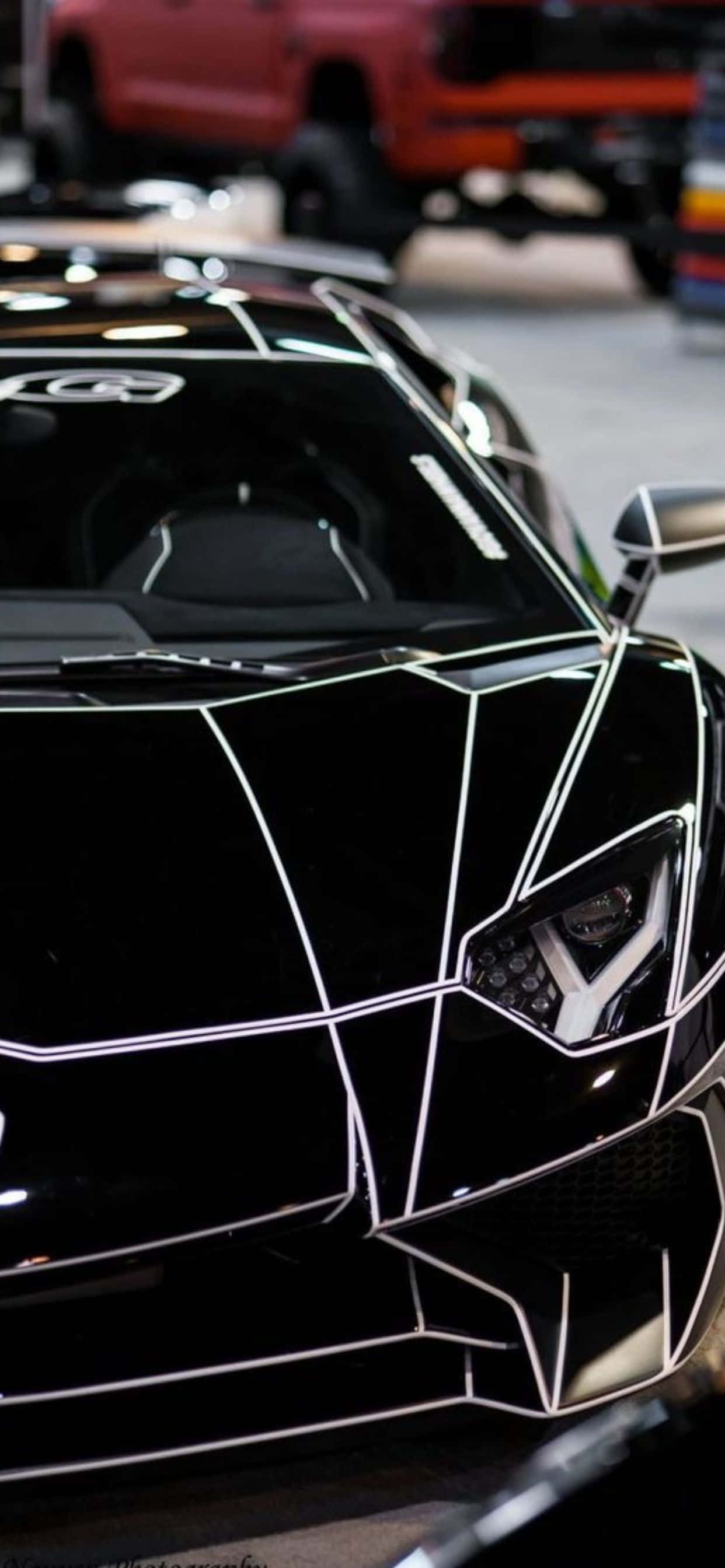iPhone XS Max Lamborghini Makintab na Itim na Background Wallpaper