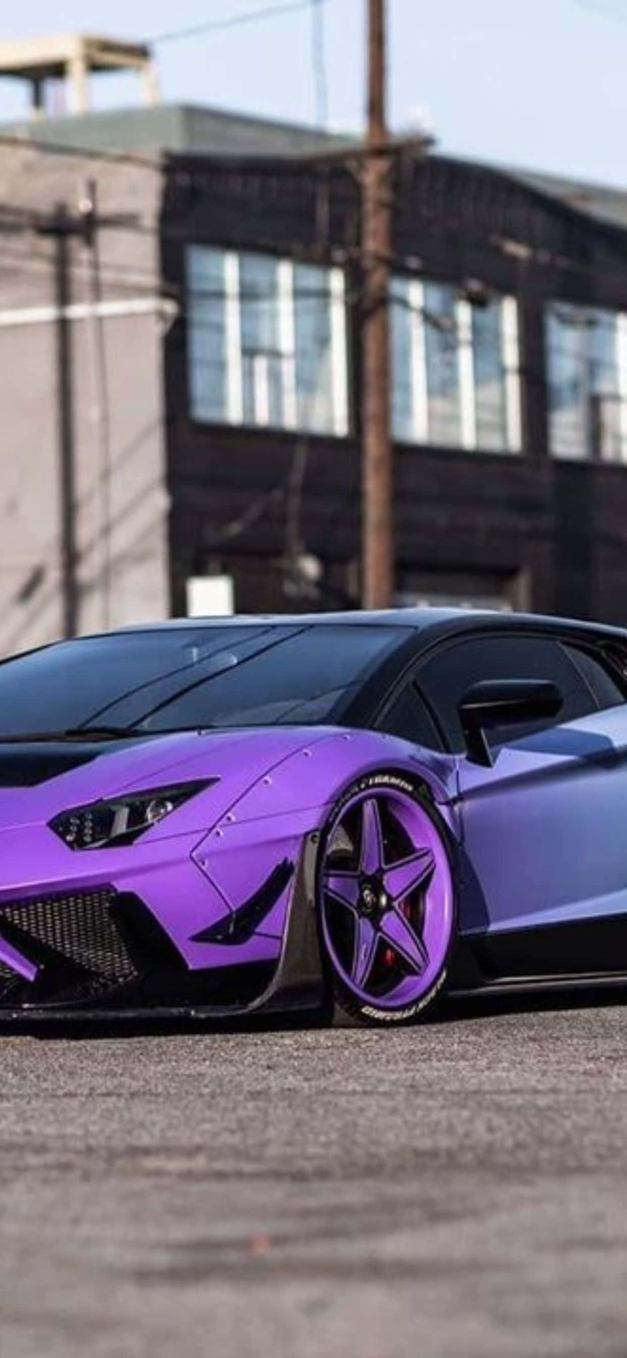 iPhone XS Max Lamborghini Purple At Black Background Wallpaper