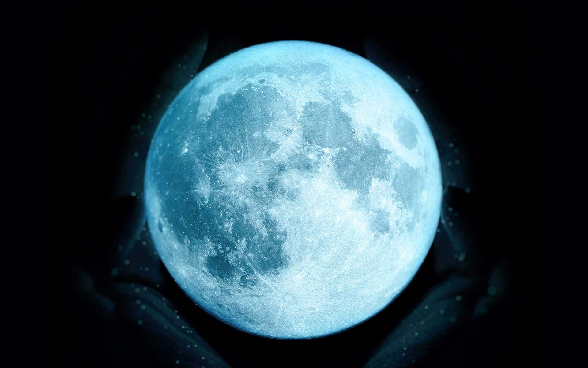isang asul na buwan na may mga kamay sa likuran Wallpaper