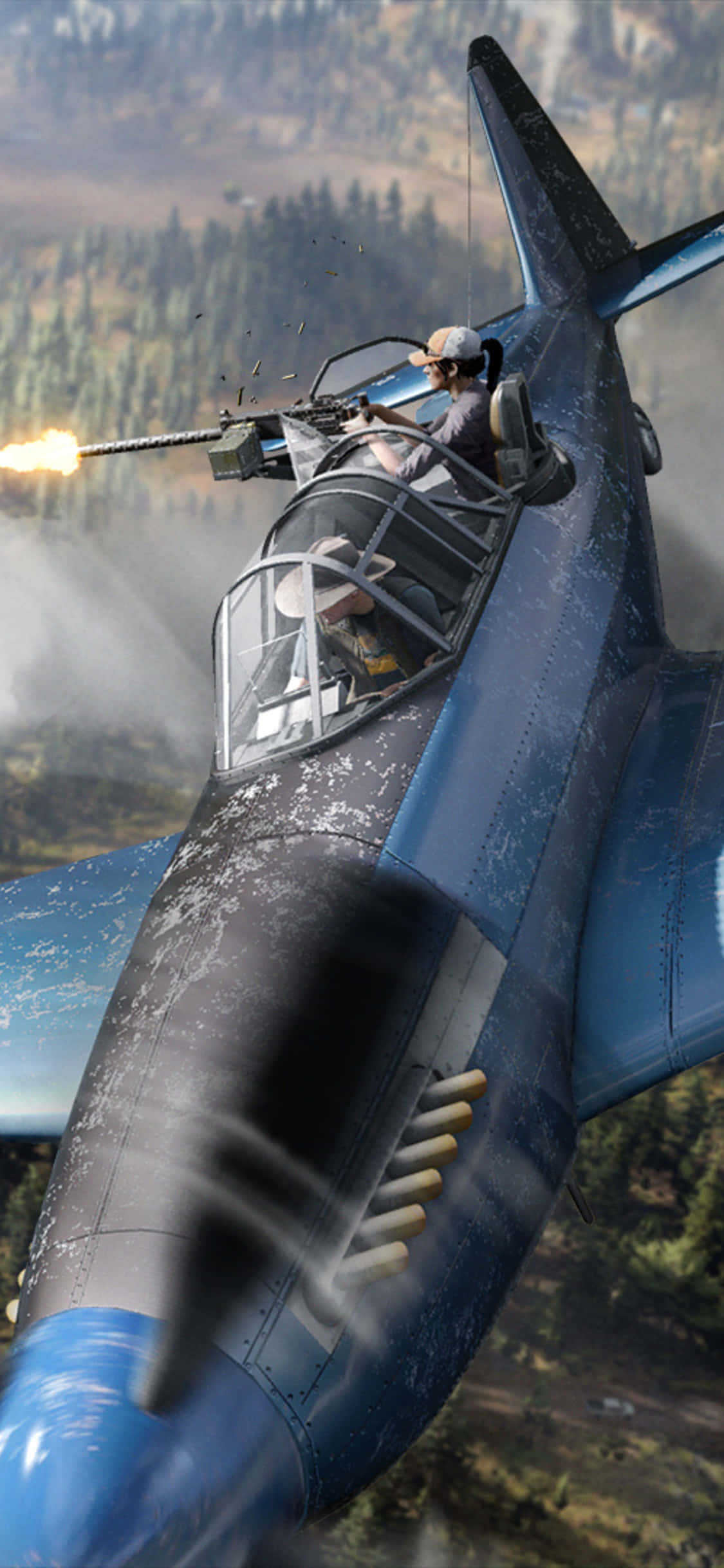 isang asul na jet plane na lumilipad sa isang gubat Wallpaper
