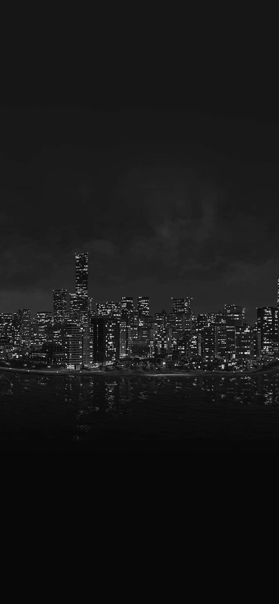 isang black and white image ng city skyline Wallpaper