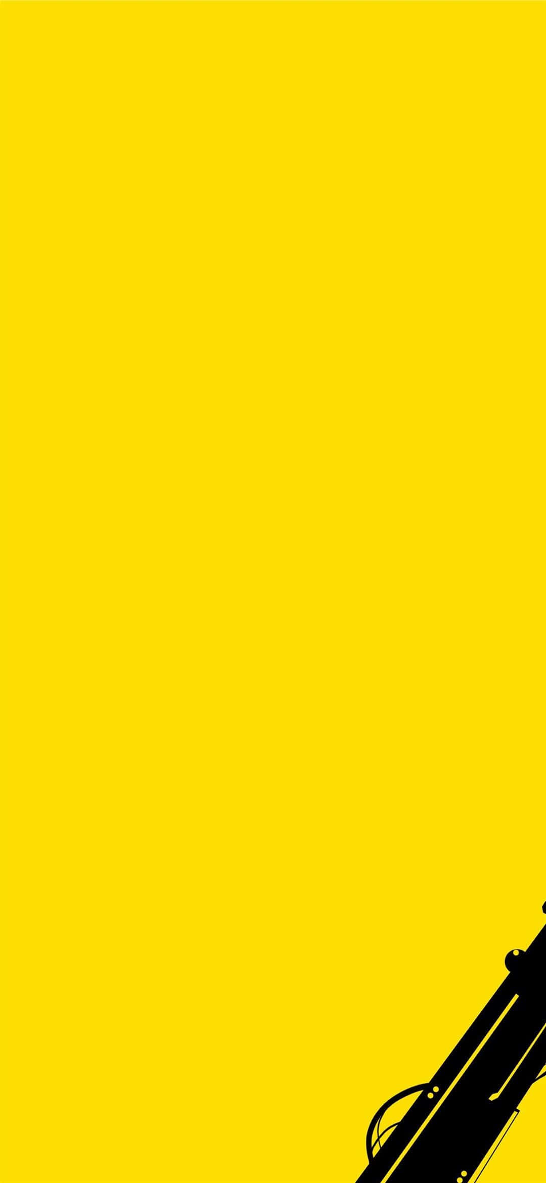 isang dilaw na background na may isang itim at puting pusa Wallpaper