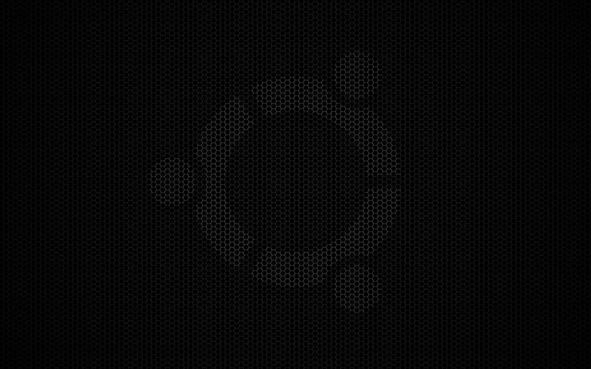 isang itim na background na may bilog dito Wallpaper