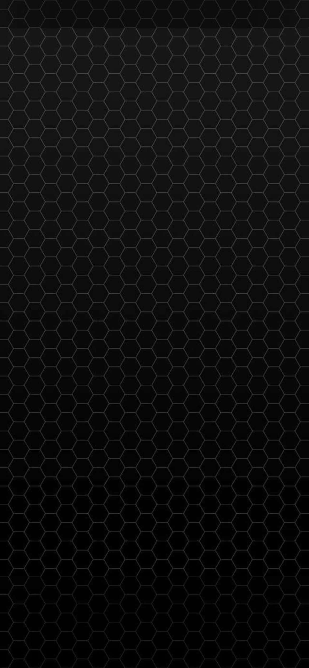 isang itim na heksagonal na pattern sa isang itim na background Wallpaper
