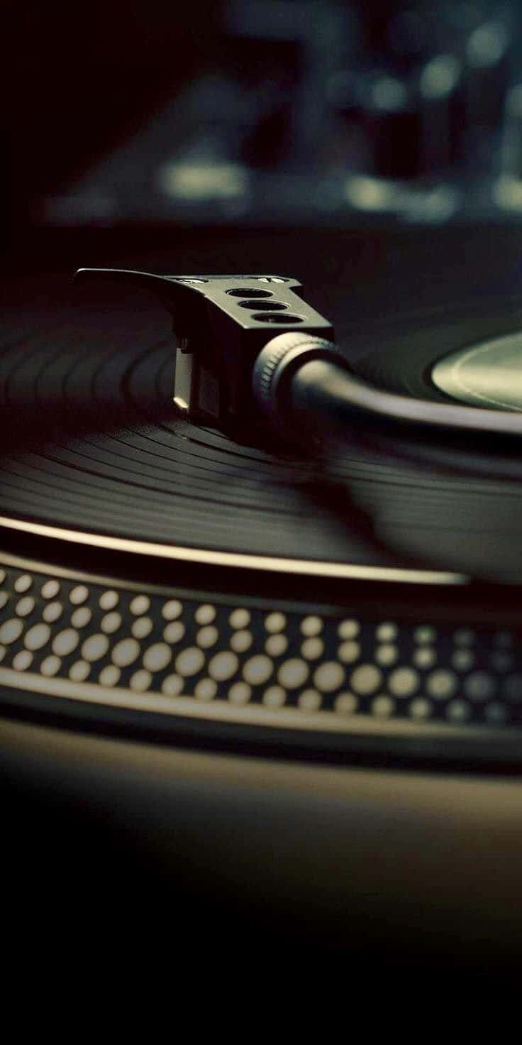 isang itim na turntable Wallpaper