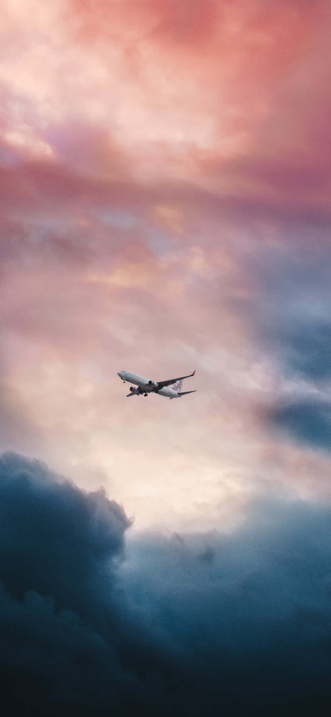 Isang kahanga-hangang tanawin ng paglubog ng araw sa isang maliit na eroplano. Wallpaper