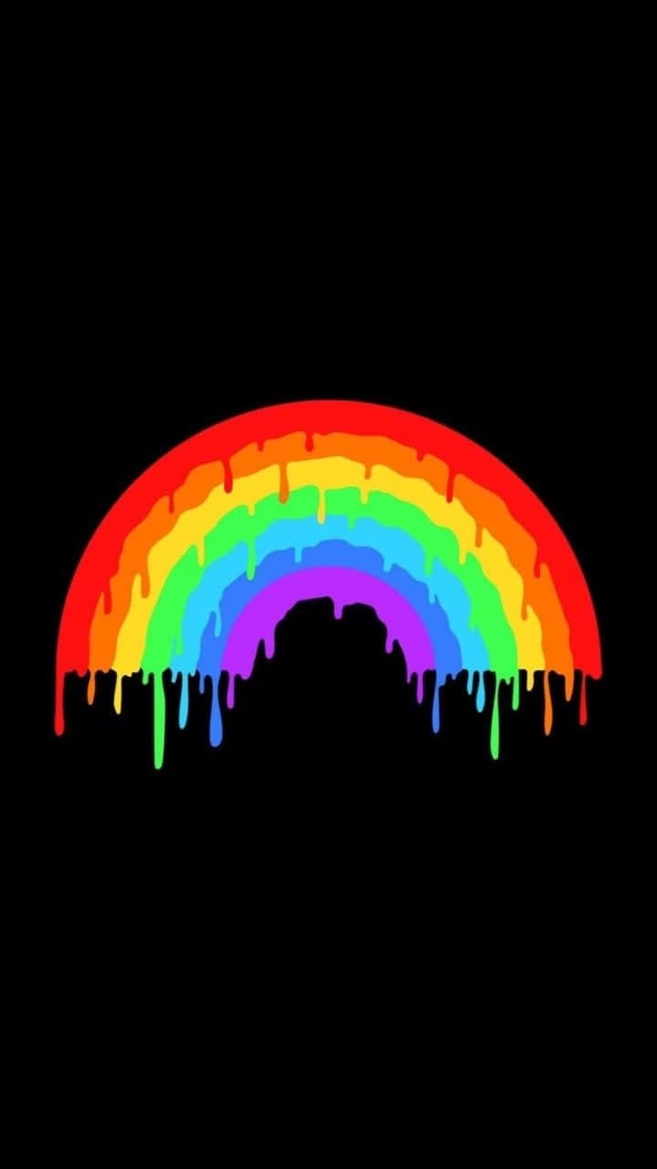 "Isang kaleidoscope ng makulay na mga kulay ang bumabalot sa kalangitan, lumilikha ng magandang rainbow aesthetic" Wallpaper