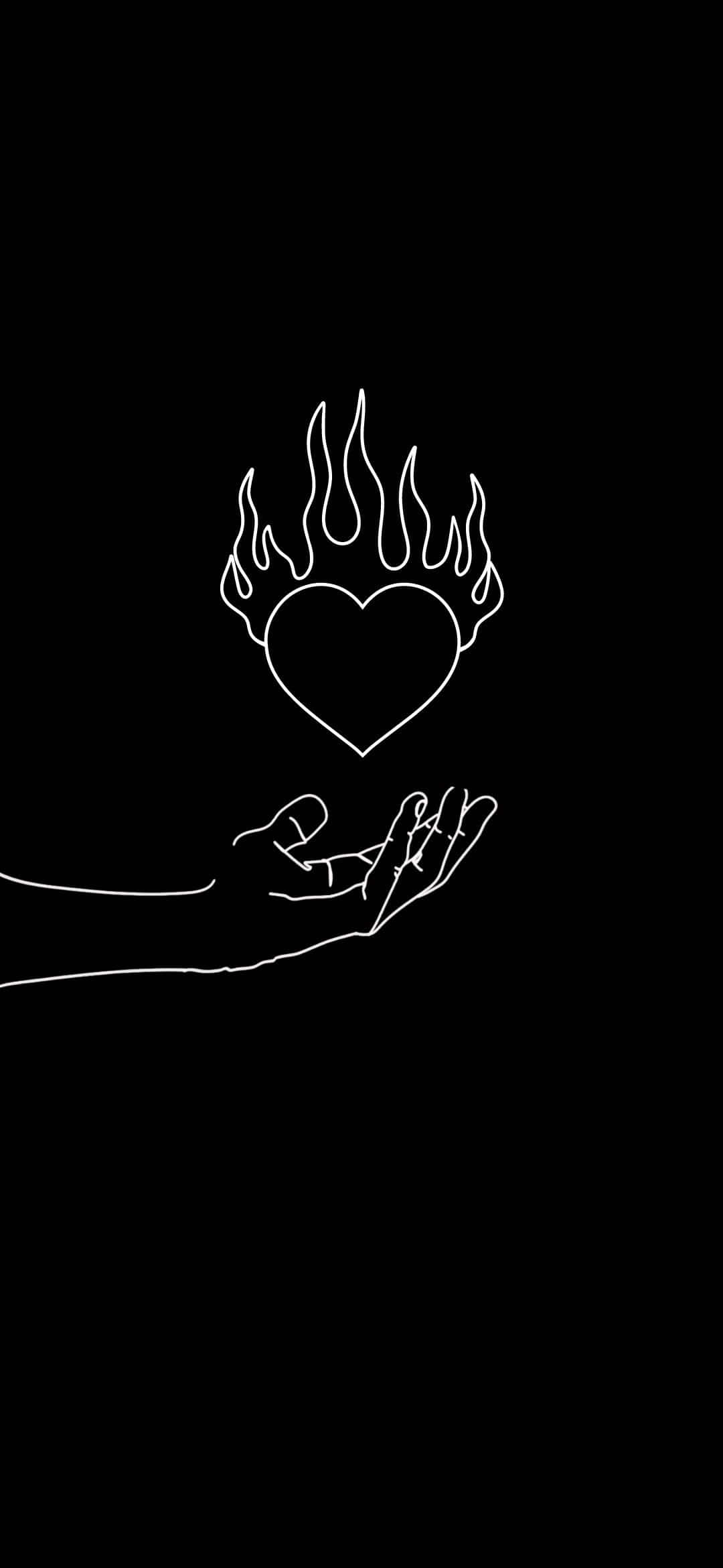 isang kamay na may hawak na puso na may apoy Wallpaper