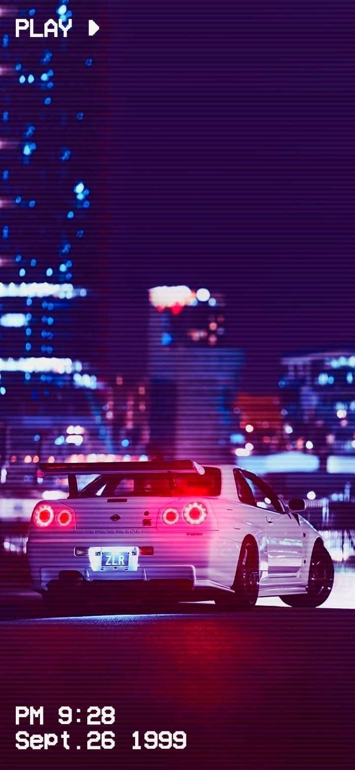 Isang klasikong Nissan Skyline JDM sa kalsada Wallpaper