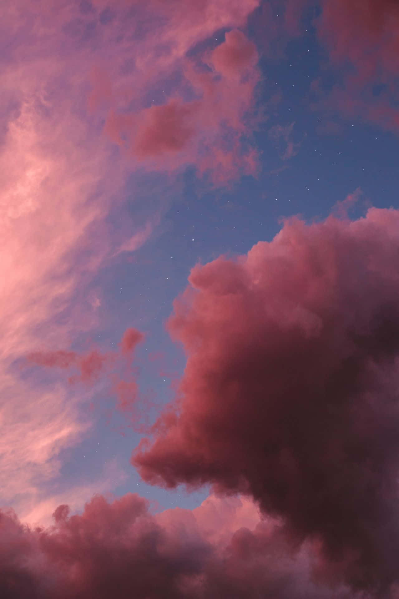 Isang magandang kalangitan na may kulay rosas at kahel Wallpaper