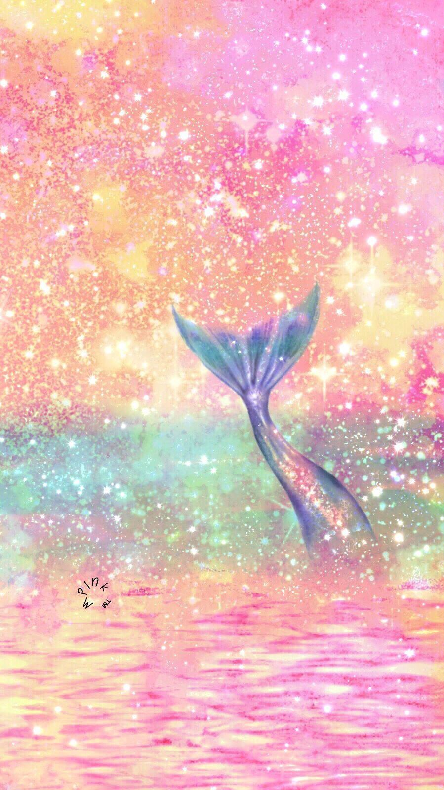 Isang Mahiwagang Buntot ng Sirena na Kumikinang sa Kulay Rosas Wallpaper