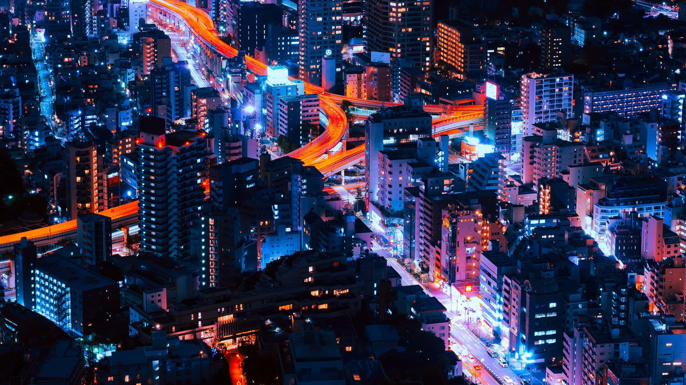 Isang makulay at masiglang neon cityscape. Wallpaper