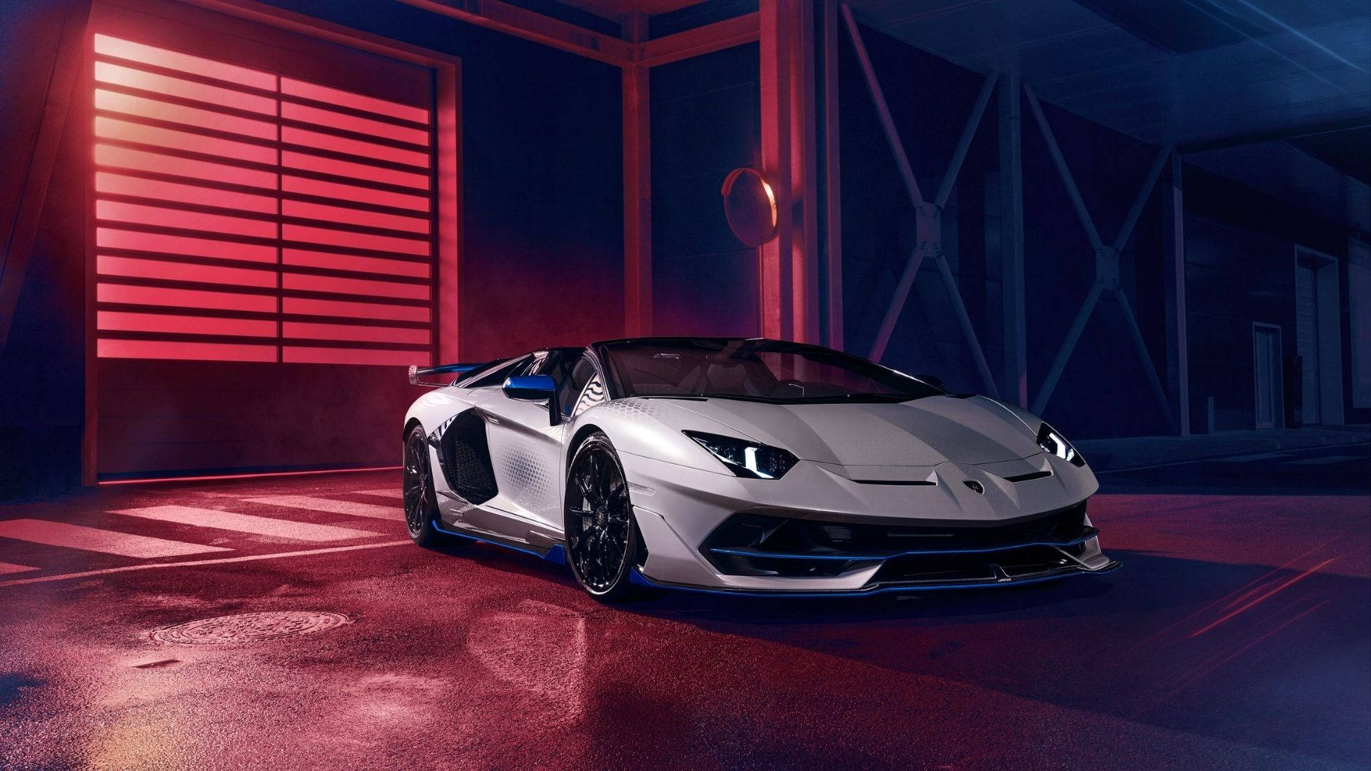 Isang nakamamanghang Lamborghini Aventador SVJ Xago sa kulay midnight blue Wallpaper